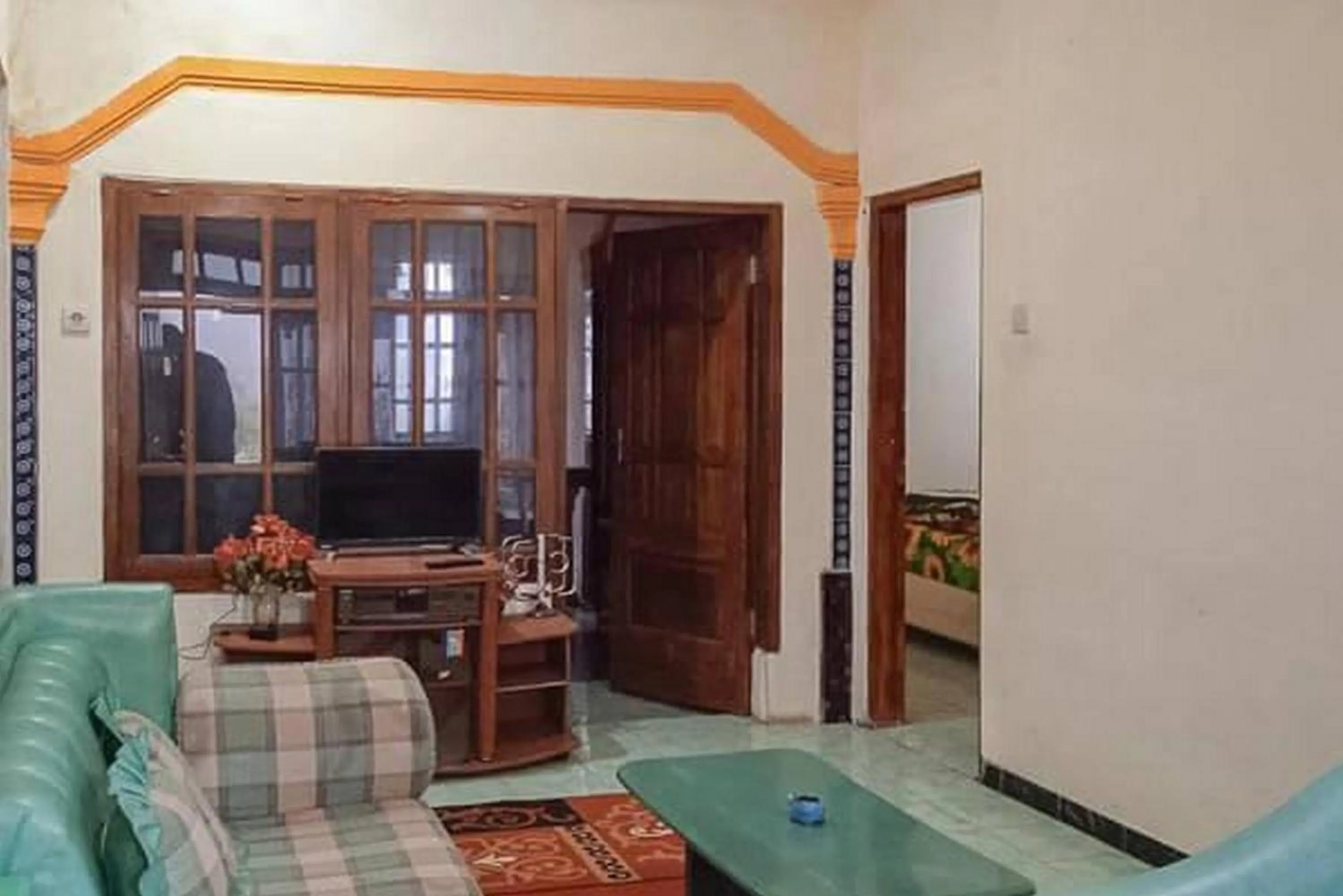 Seating area in Gebby Homestay Bromo RedPartner