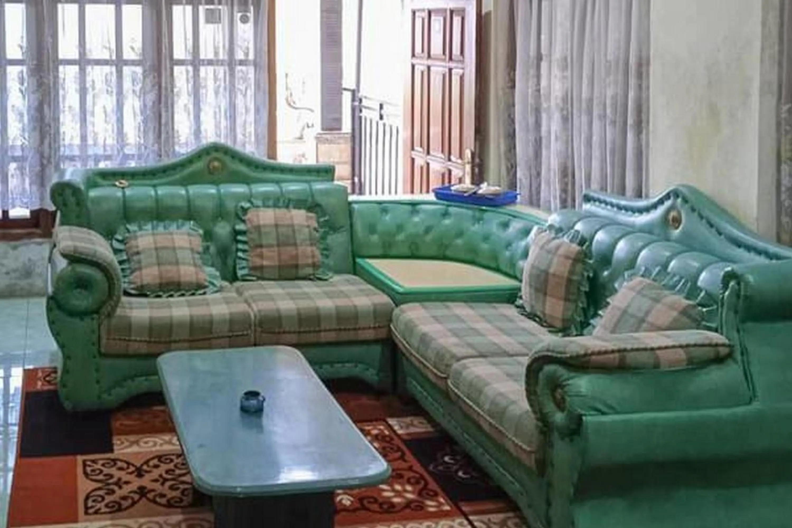 Seating area in Gebby Homestay Bromo RedPartner