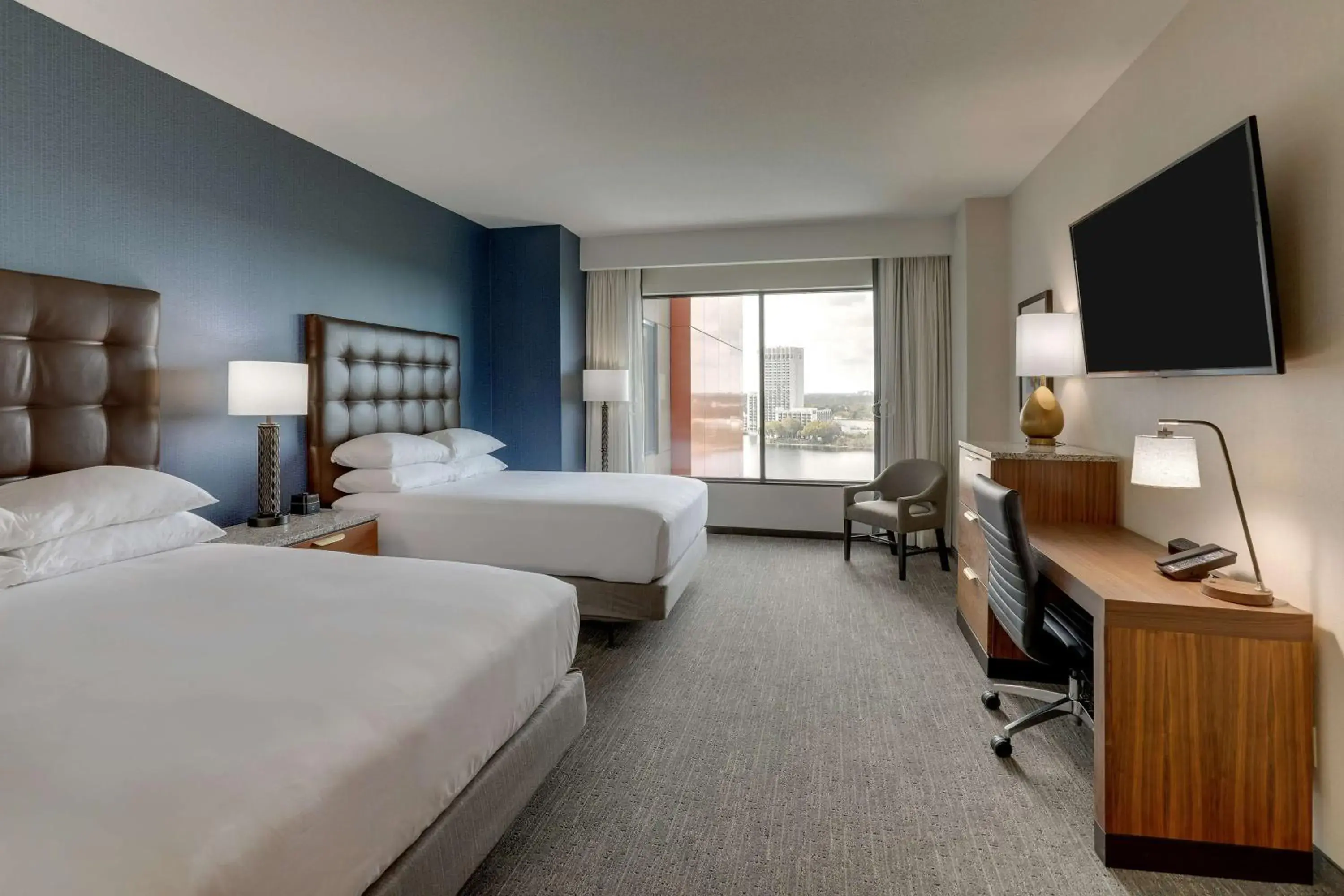 Deluxe Queen Room with Two Queen Beds - Terrace, Nightly views of area fireworks in Drury Plaza Hotel Orlando - Disney Springs Area Deluxe Queen Room with Two Queen Beds - Terrace, Nightly views of area fireworks in Drury Plaza Hotel Orlando - Disney Springs Area