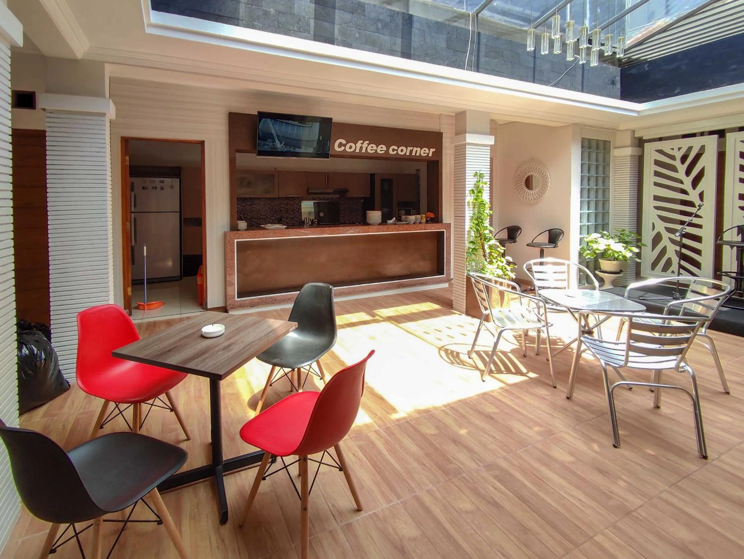 Seating area in Maita Homestay Ringroad Utara Mitra RedDoorz