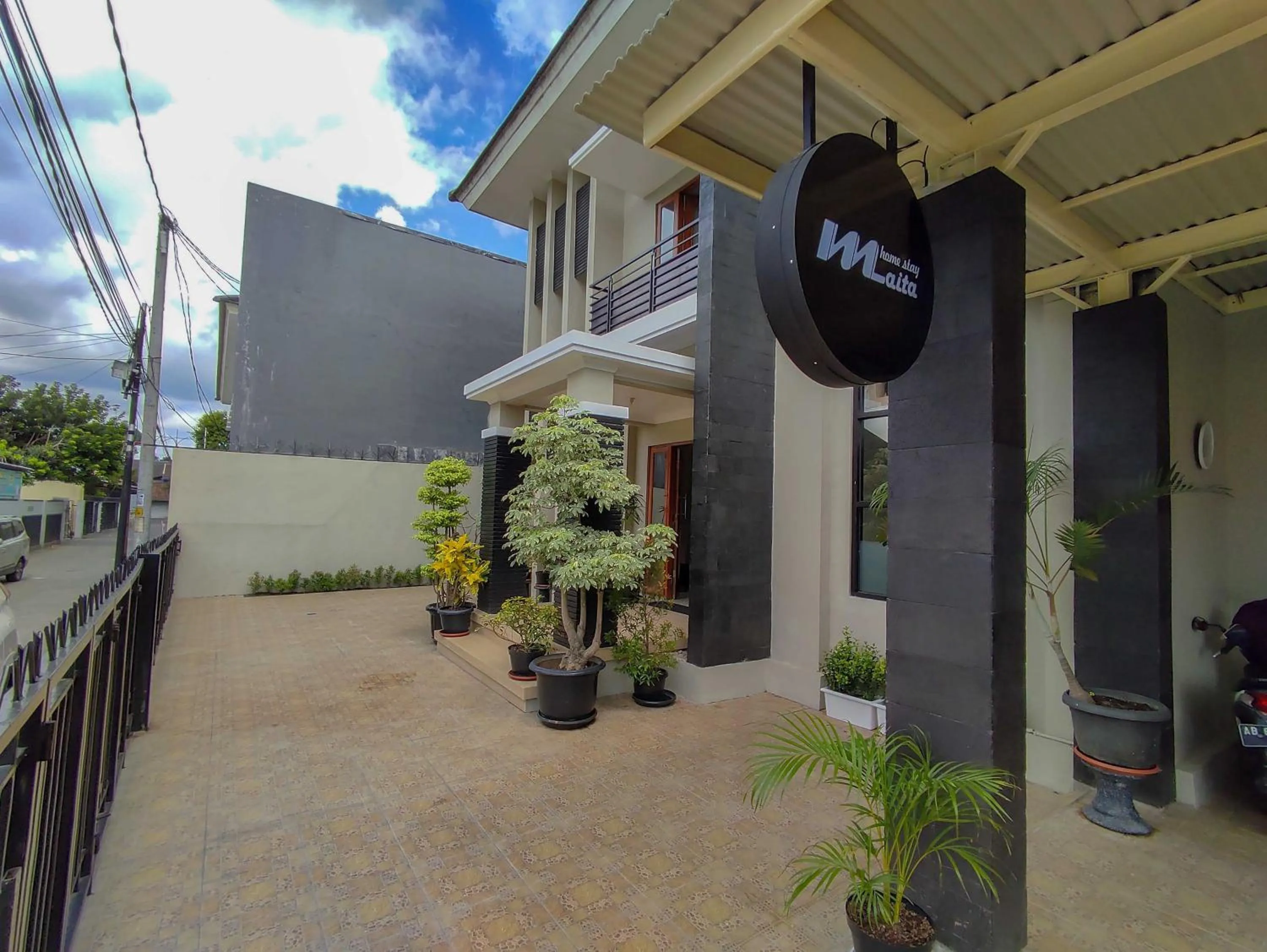 Property logo or sign in Maita Homestay Ringroad Utara Mitra RedDoorz