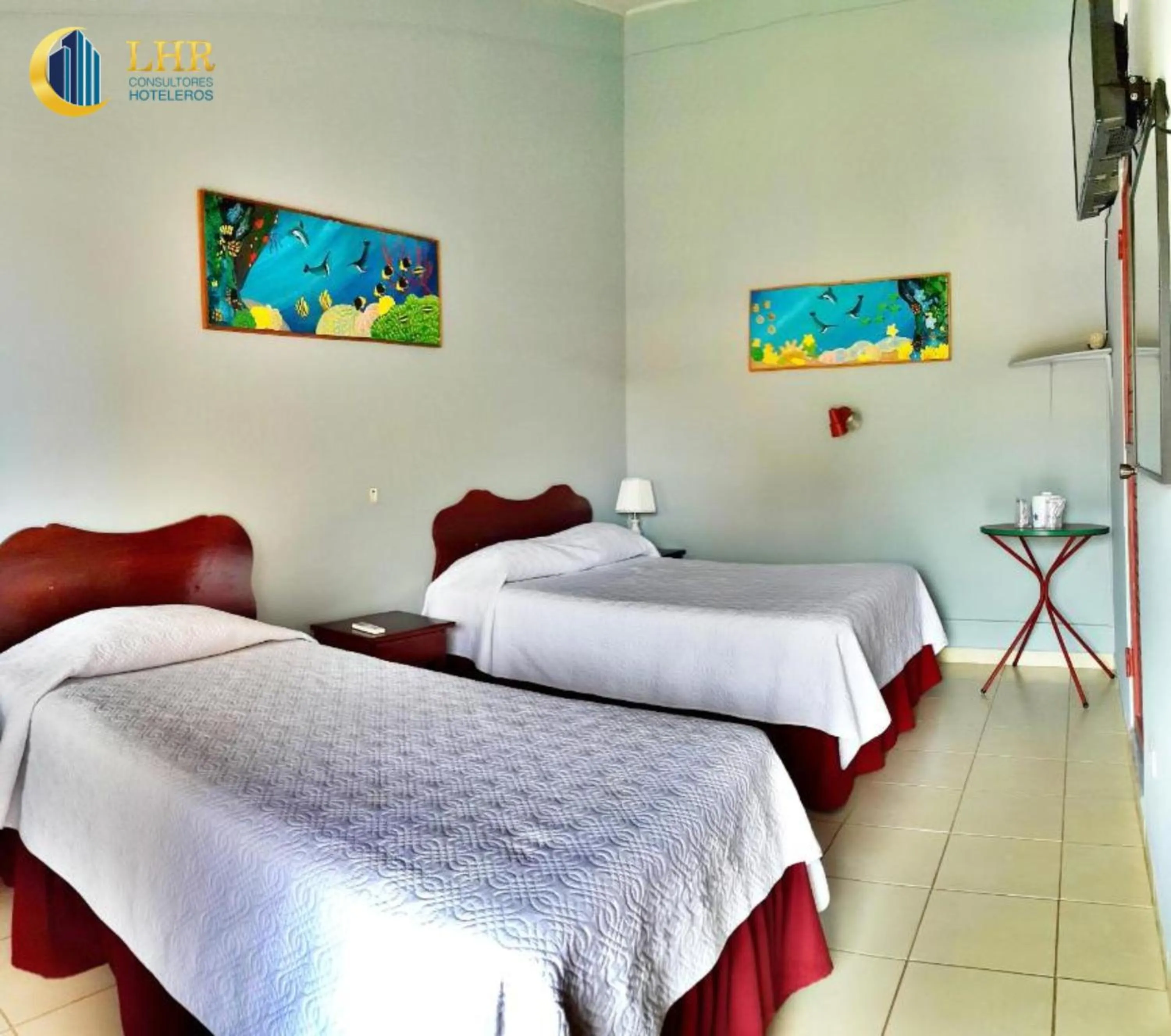 Bed in Hotel Divisamar by LHR