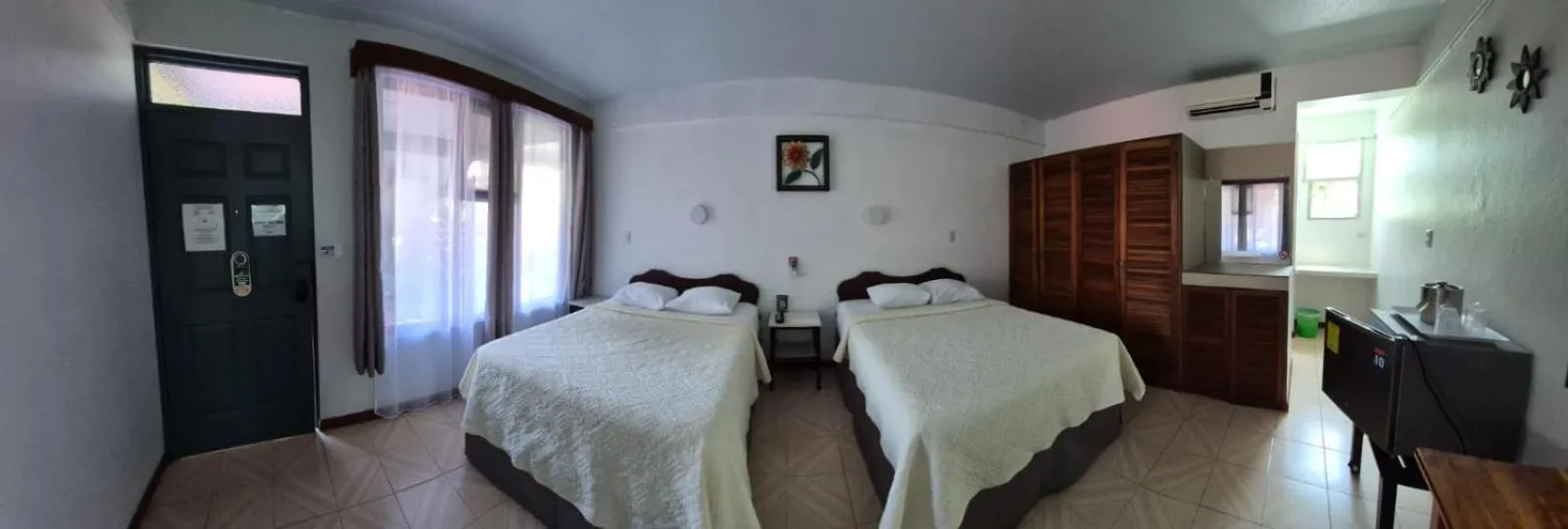 Bed in Hotel Divisamar by LHR