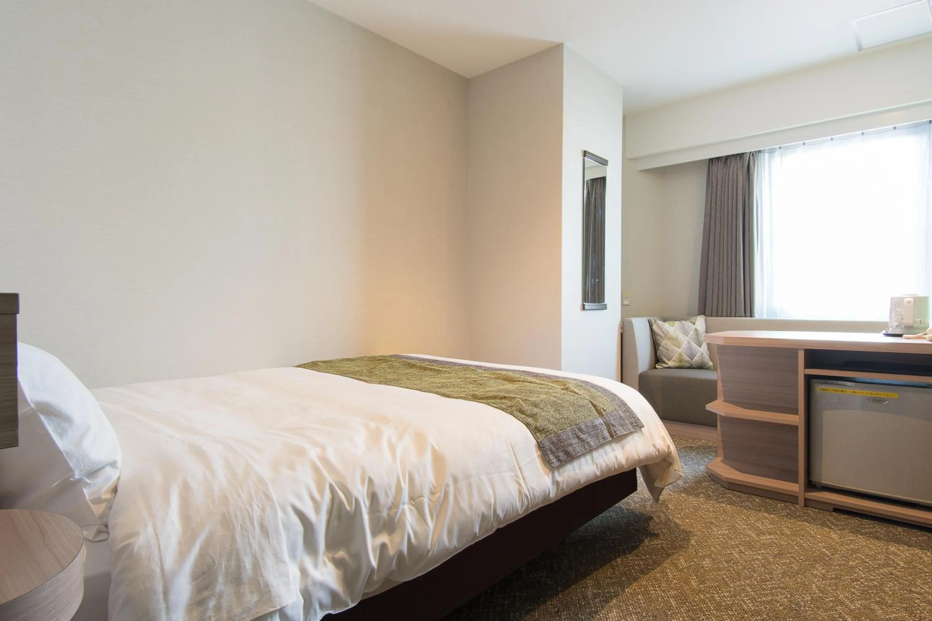 Bed in Fujinomiya Fujikyu Hotel