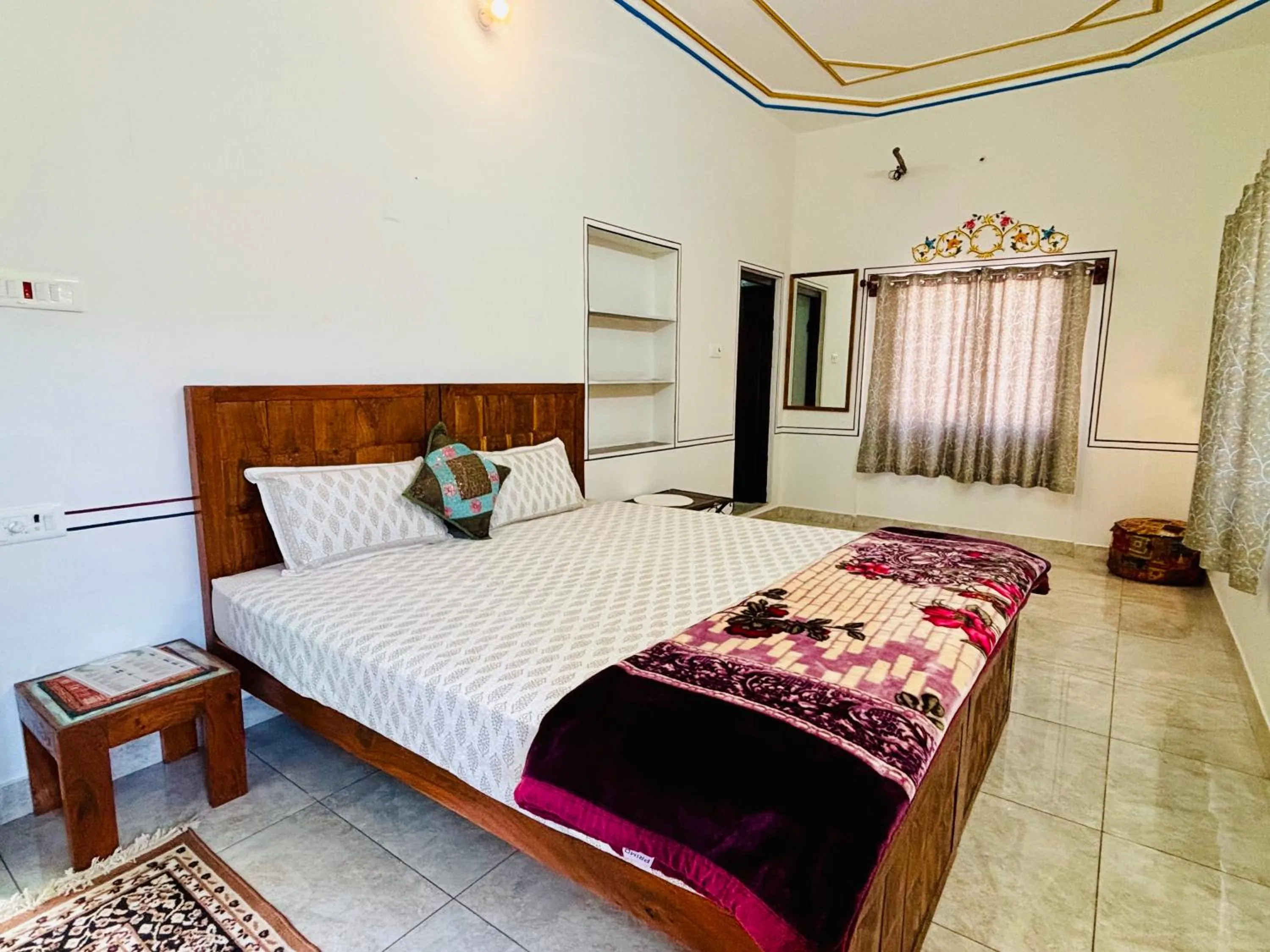 Bed in Hotel tulsi palace