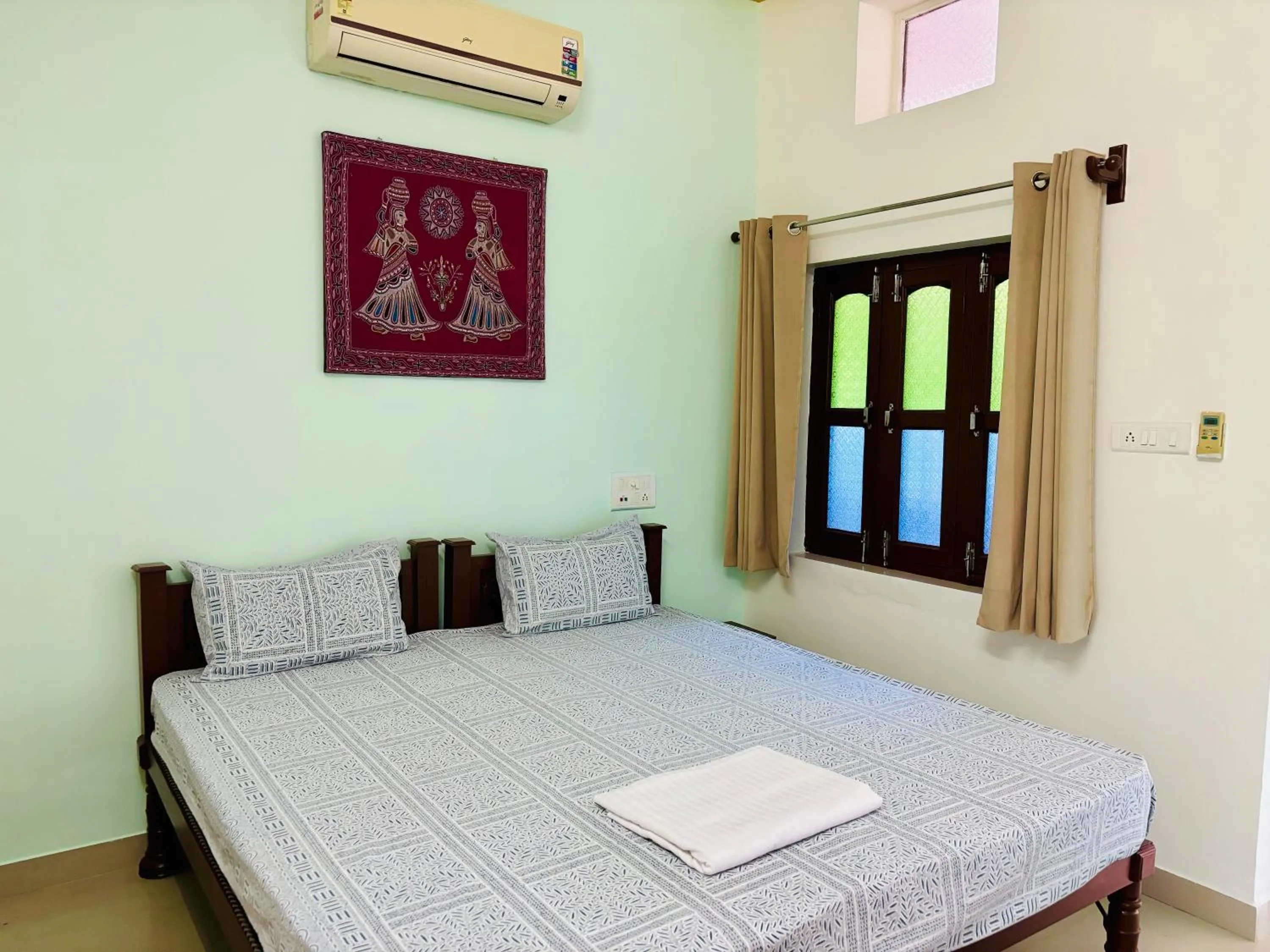 Bed in Hotel tulsi palace