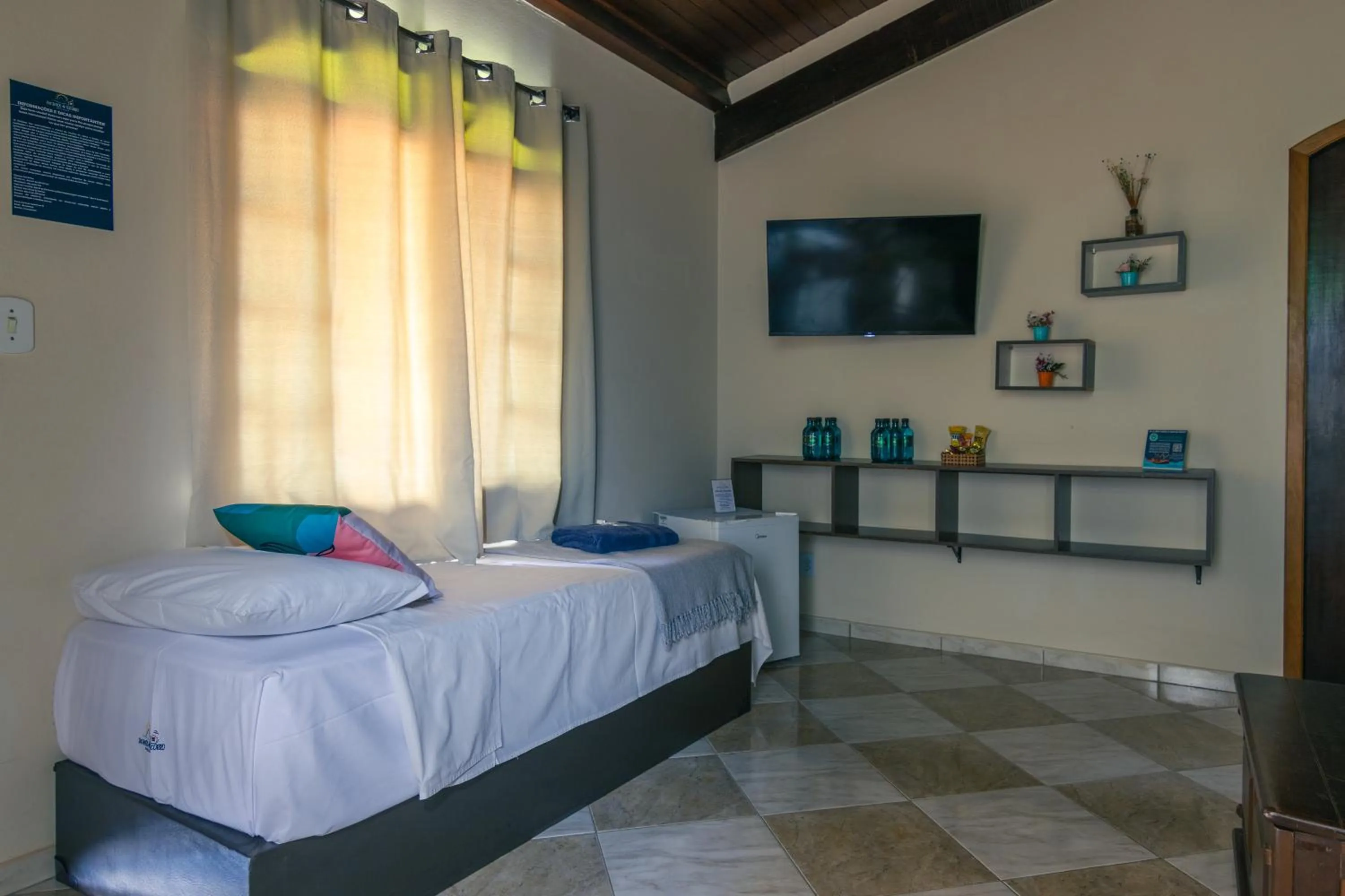 Bed in Pousada Encantos de Socorro