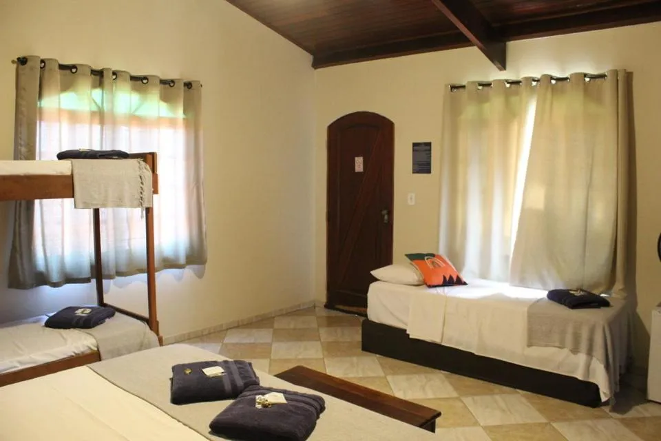 Bed in Pousada Encantos de Socorro