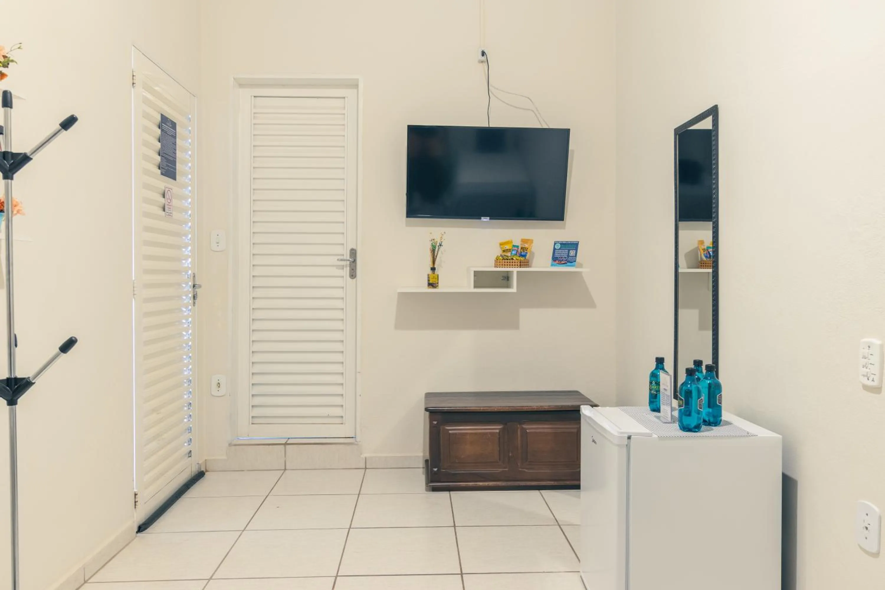 TV and multimedia in Pousada Encantos de Socorro