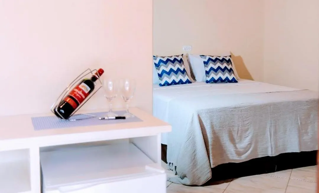 Bed in Pousada Encantos de Socorro