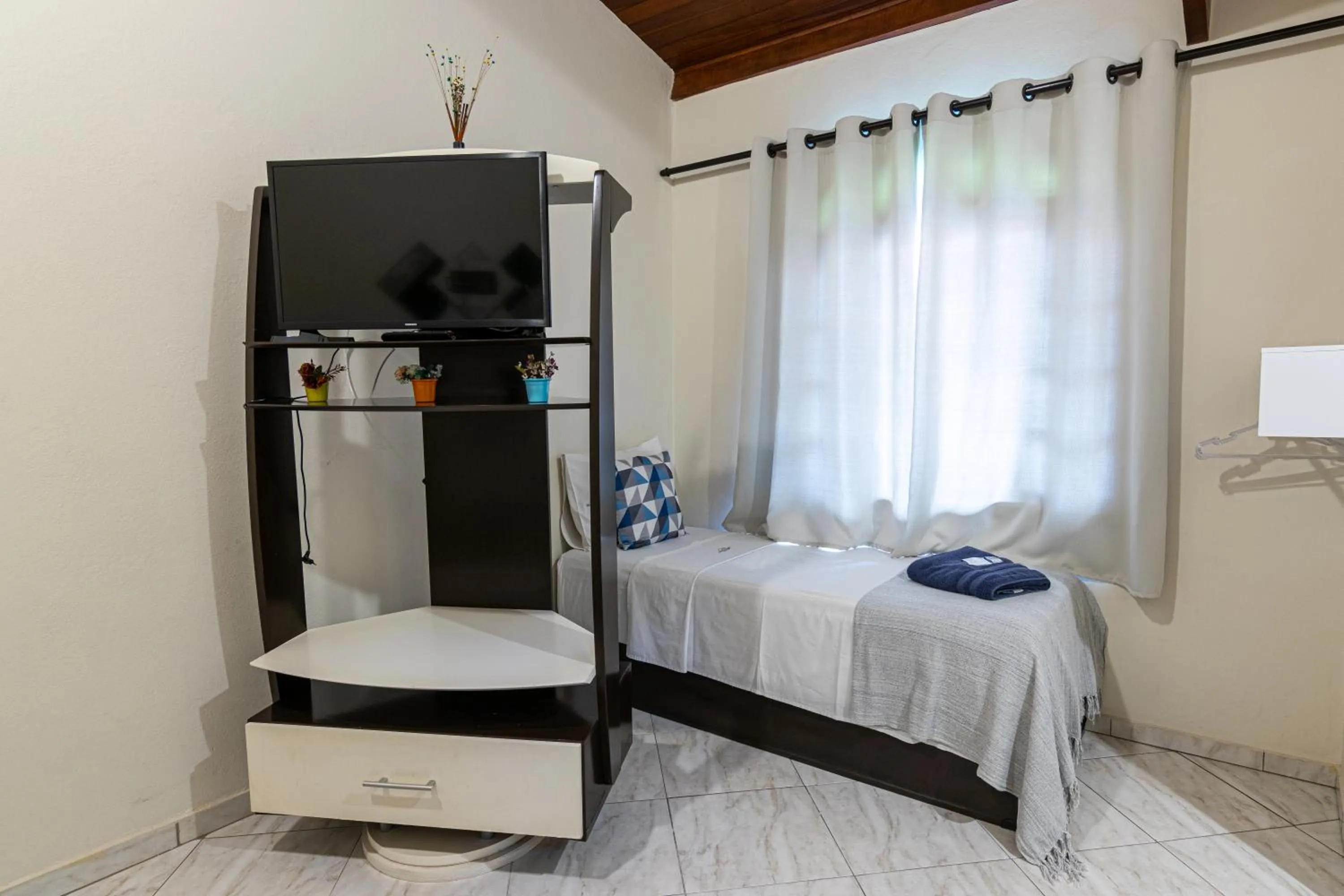 TV and multimedia, Bed in Pousada Encantos de Socorro