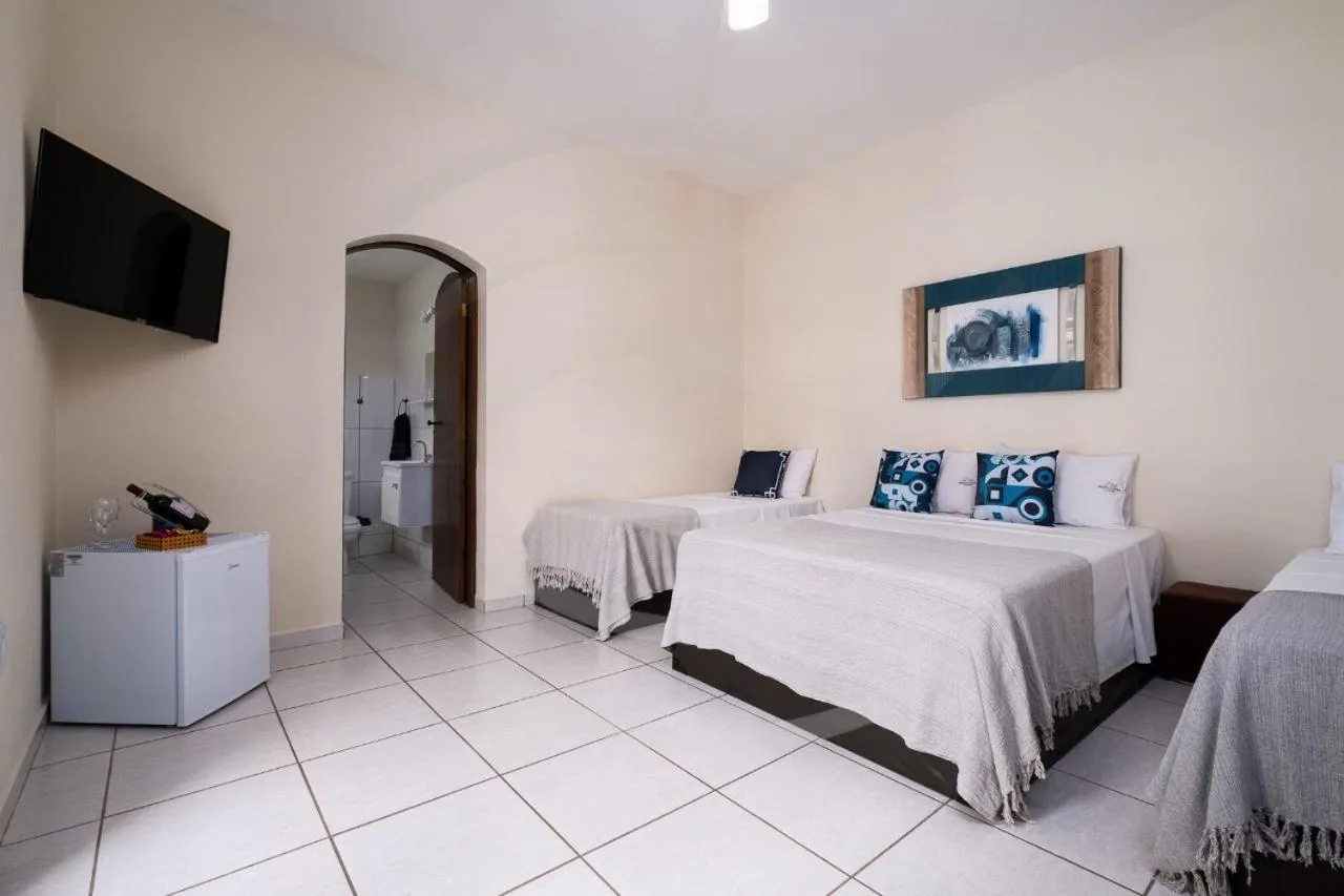 Bed in Pousada Encantos de Socorro