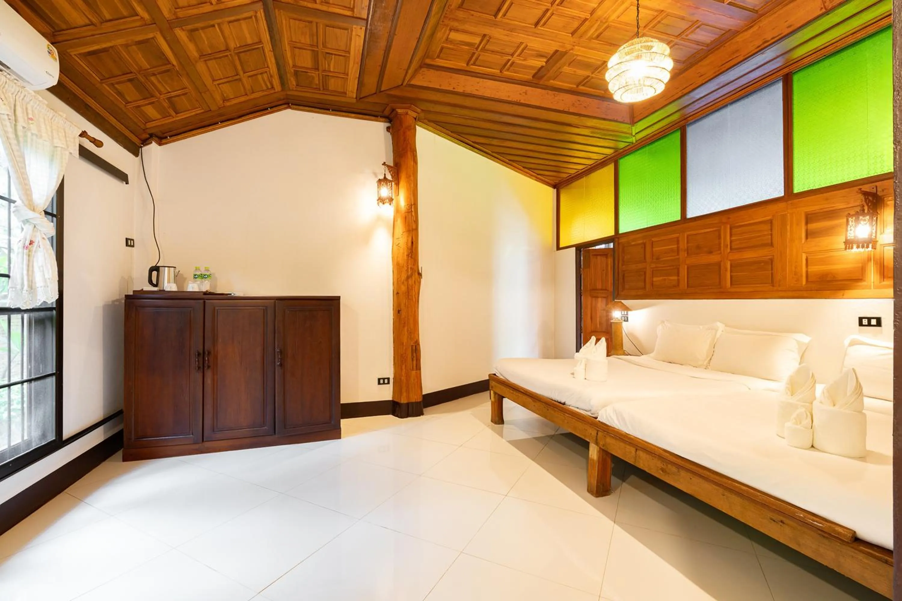 Bed in Romsak Lanna Resort