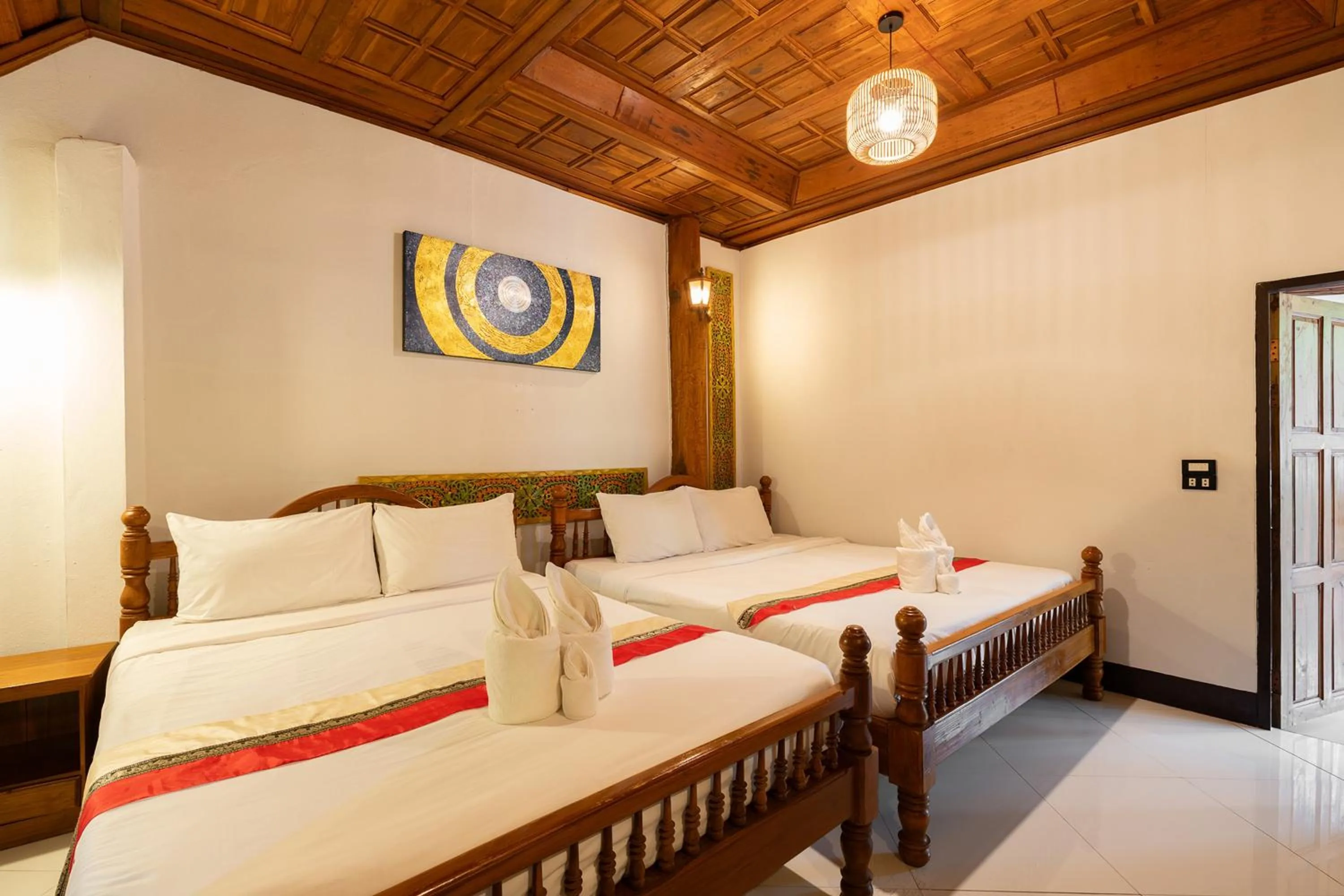 Bed in Romsak Lanna Resort