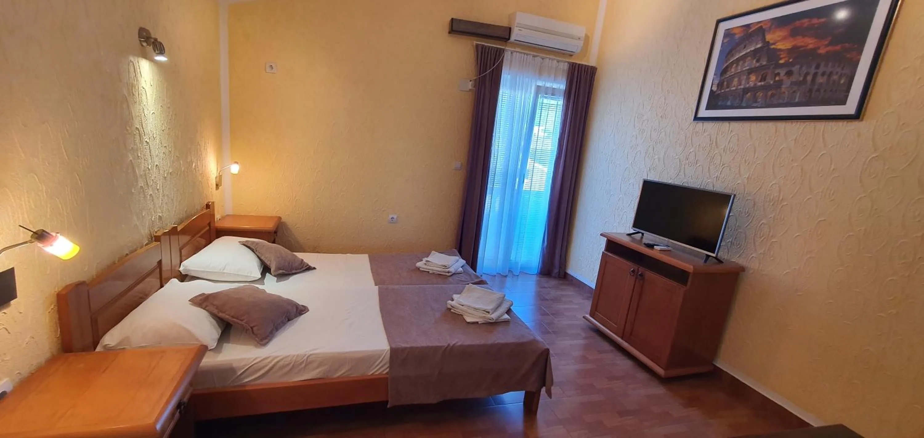 Bed in Martinović Rooms