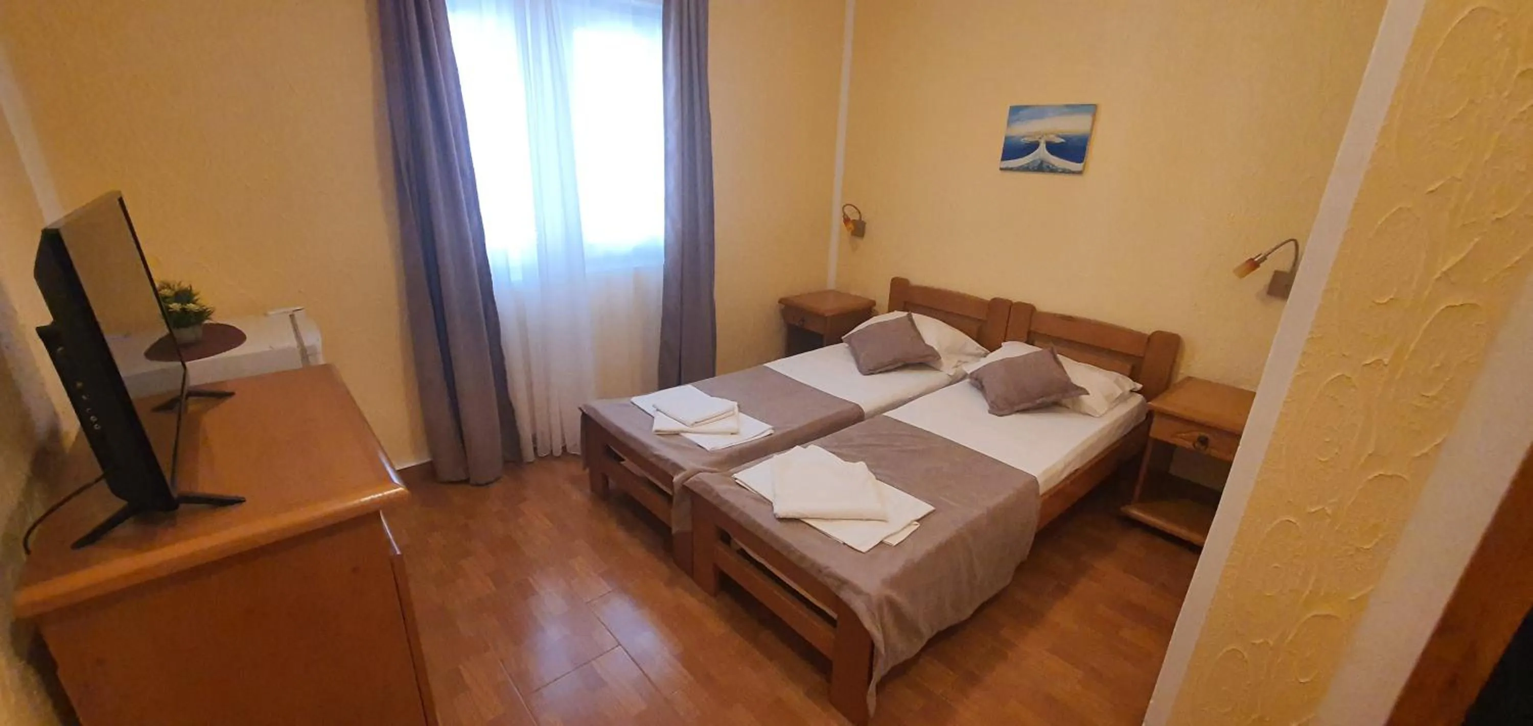 Bed in Martinović Rooms