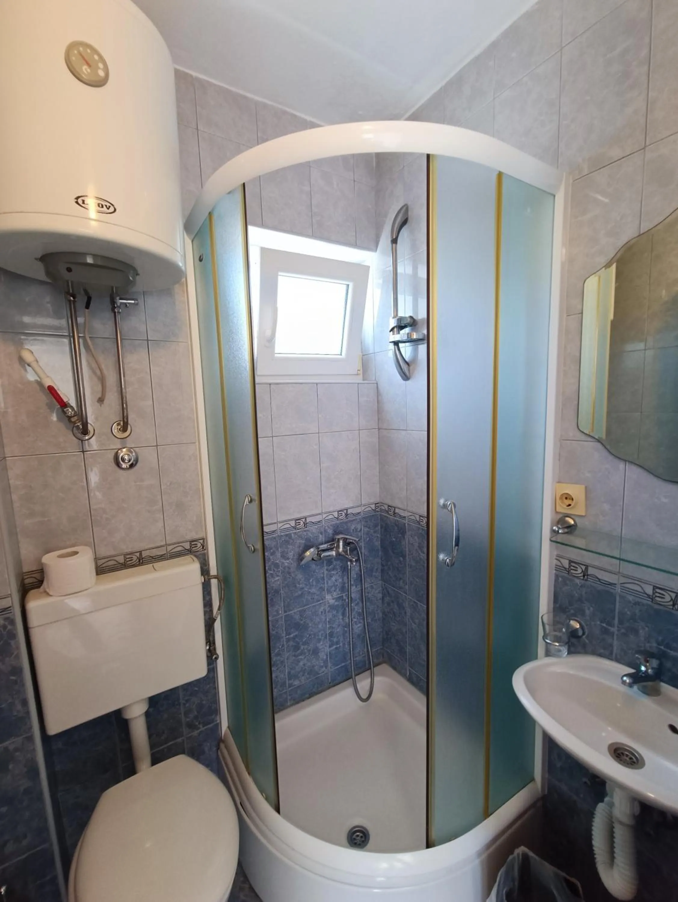 Shower in Martinović Rooms