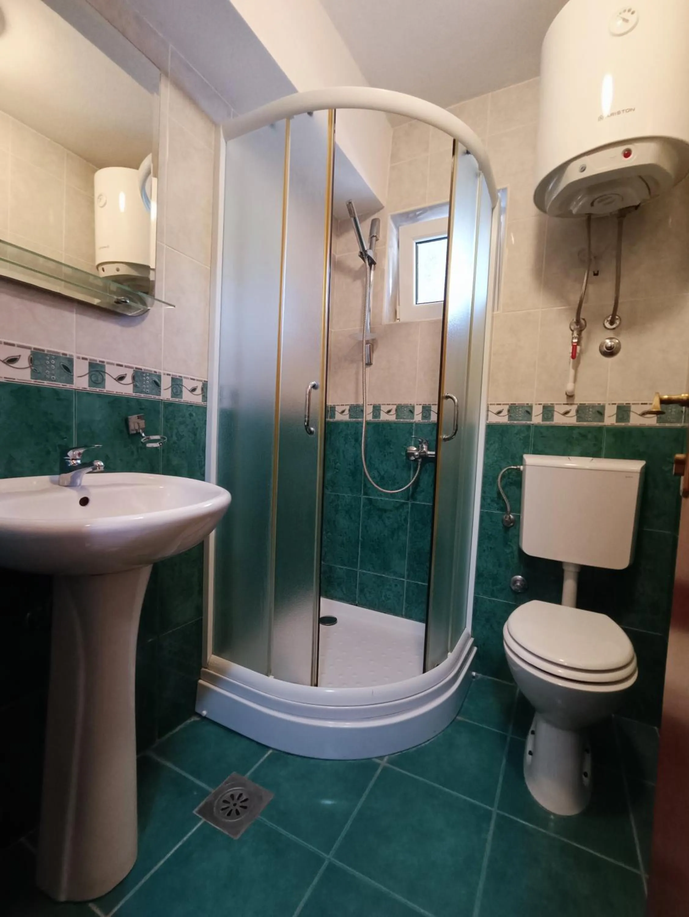 Bathroom in Martinović Rooms