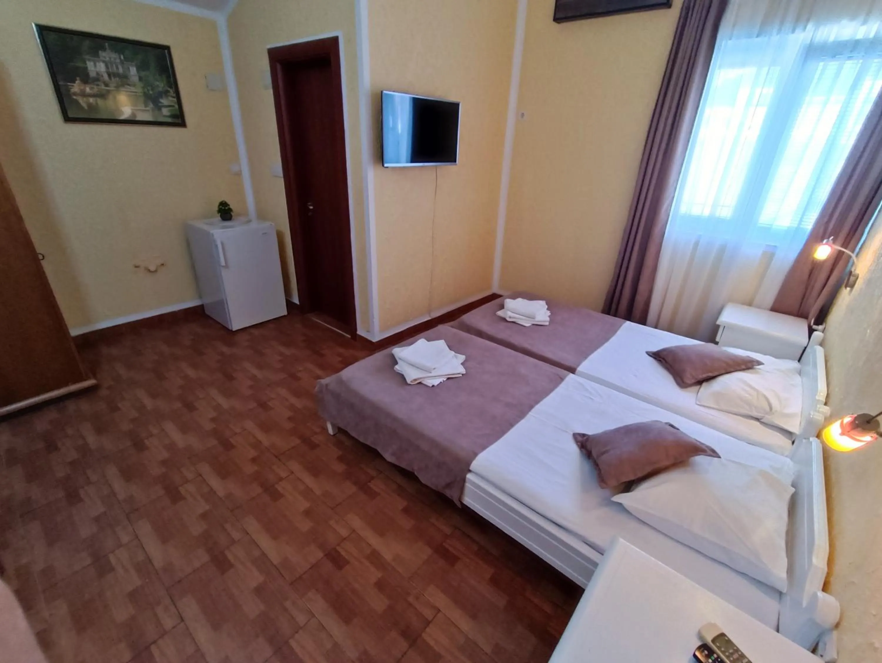 Bed in Martinović Rooms