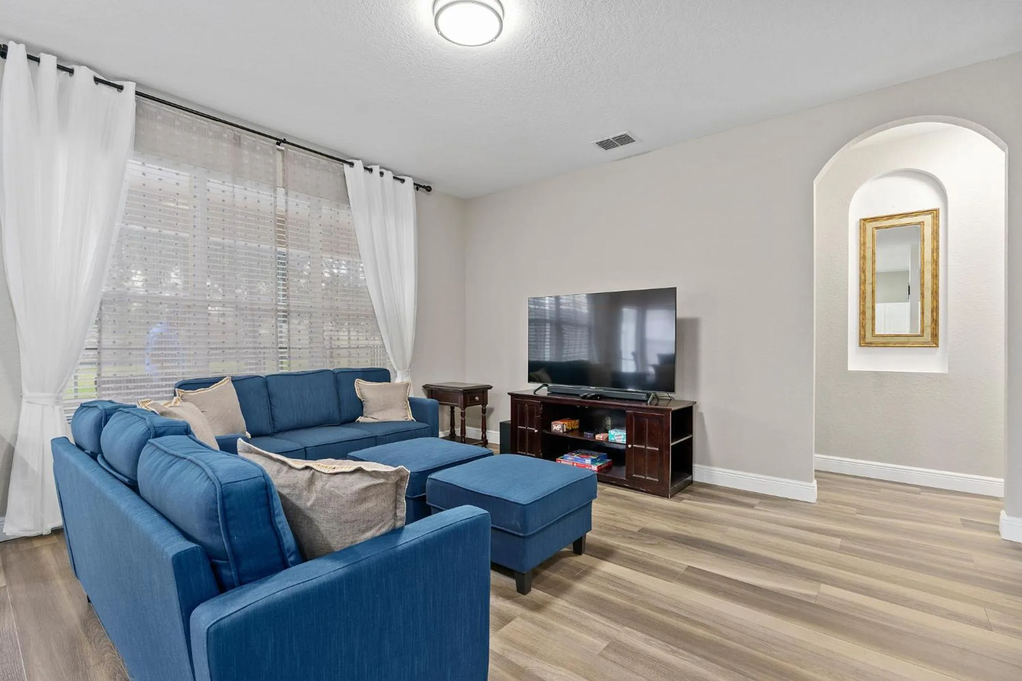 Living room in WindsorHills Villa Pool Resort Amenities Minutes to Disney