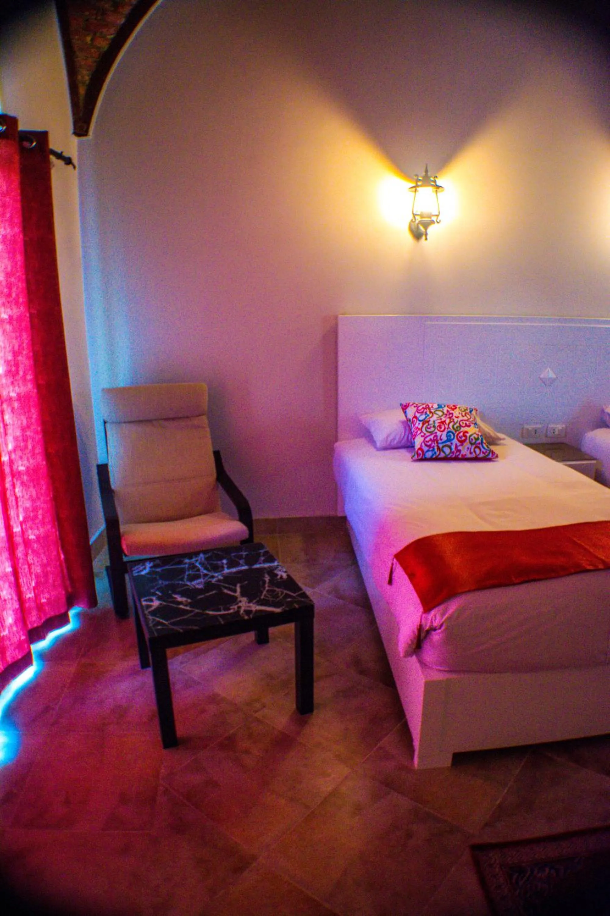 Seating area, Bed in NUB INN