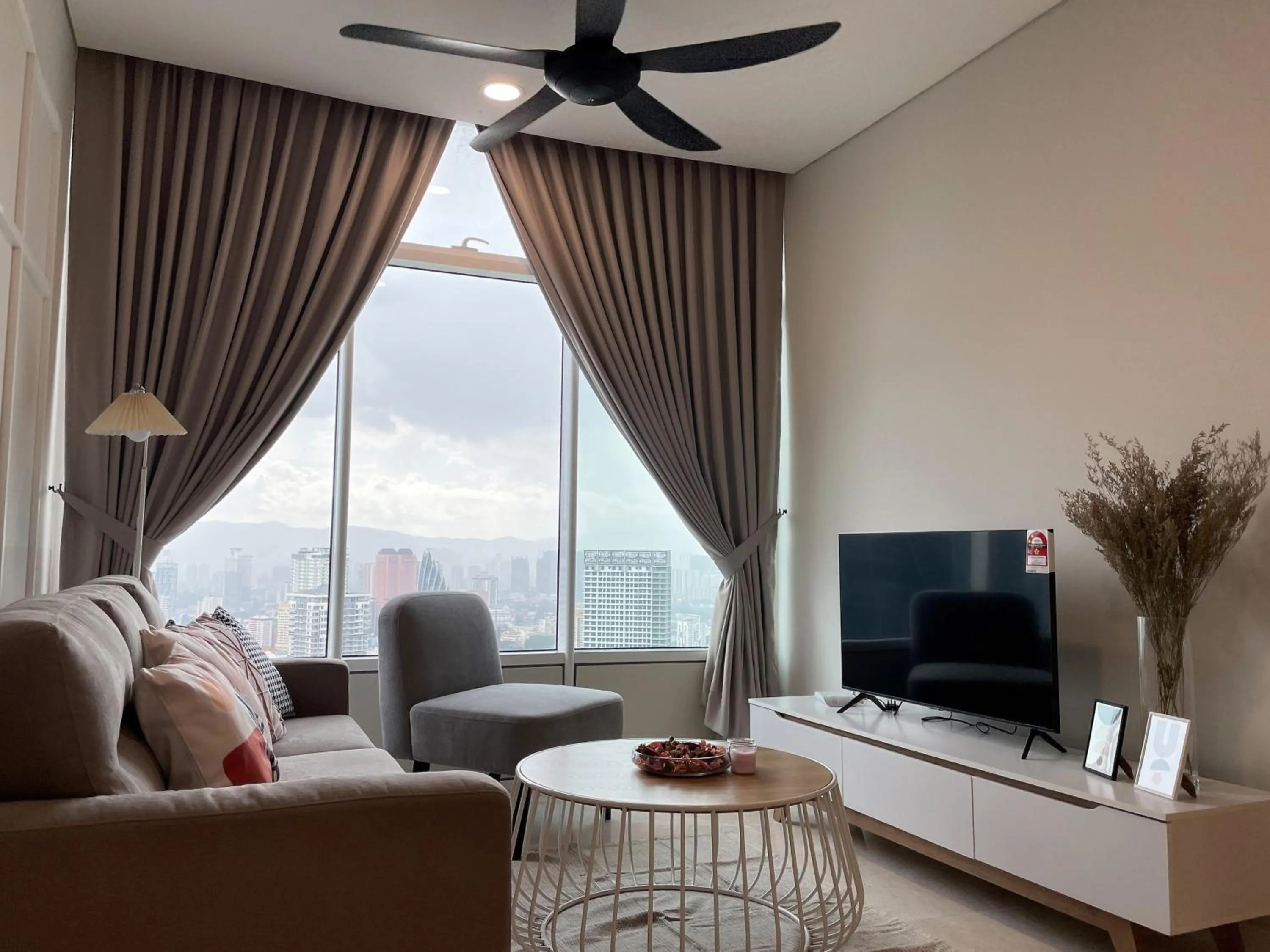 Living room in KLCC Homestay Vacation Sky Suites KLCC Birdy Stay