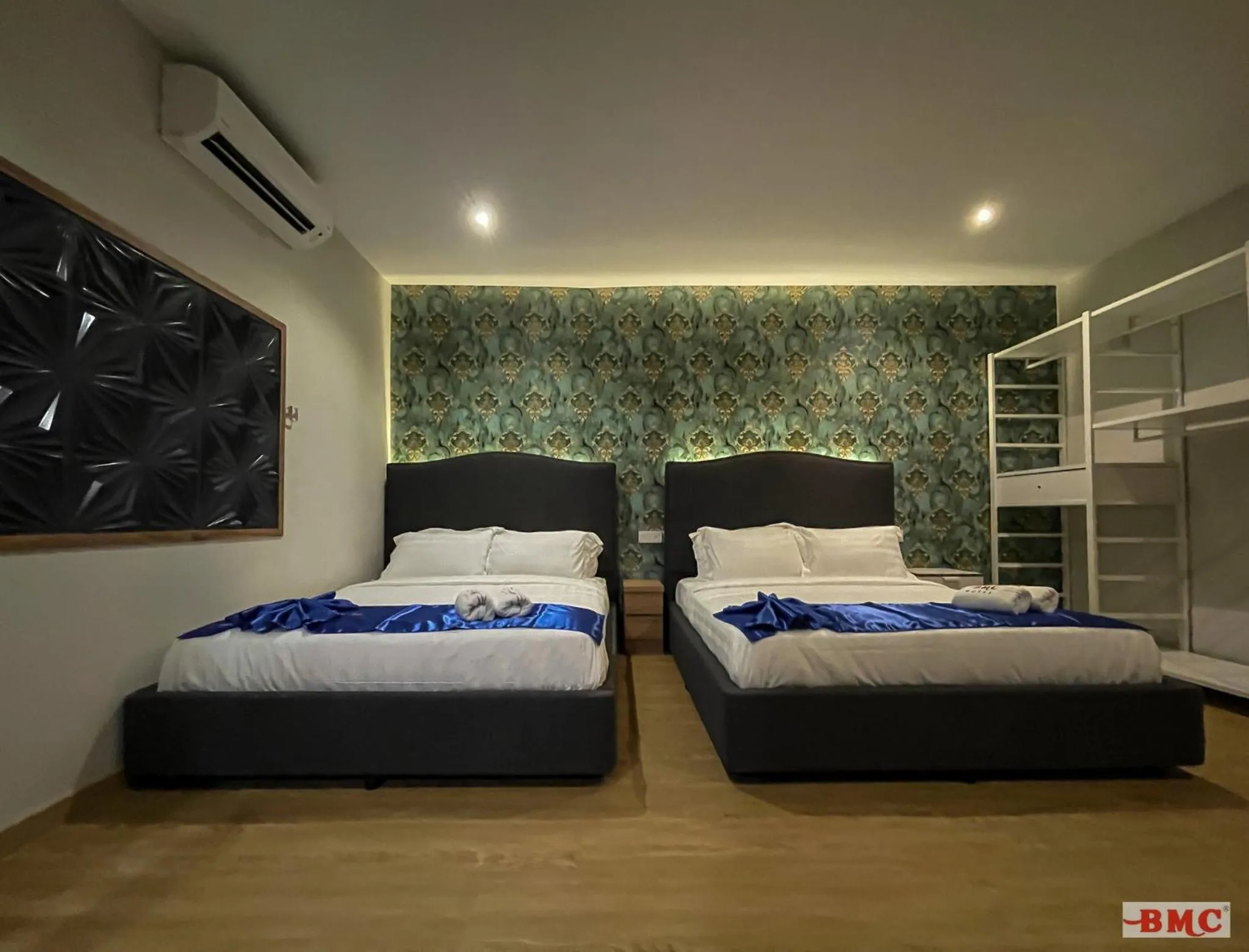 Bedroom in BMC Hotel