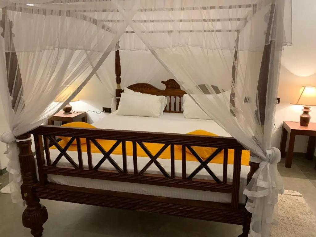 Bed in Pinipahana Walauwa Resort & villa