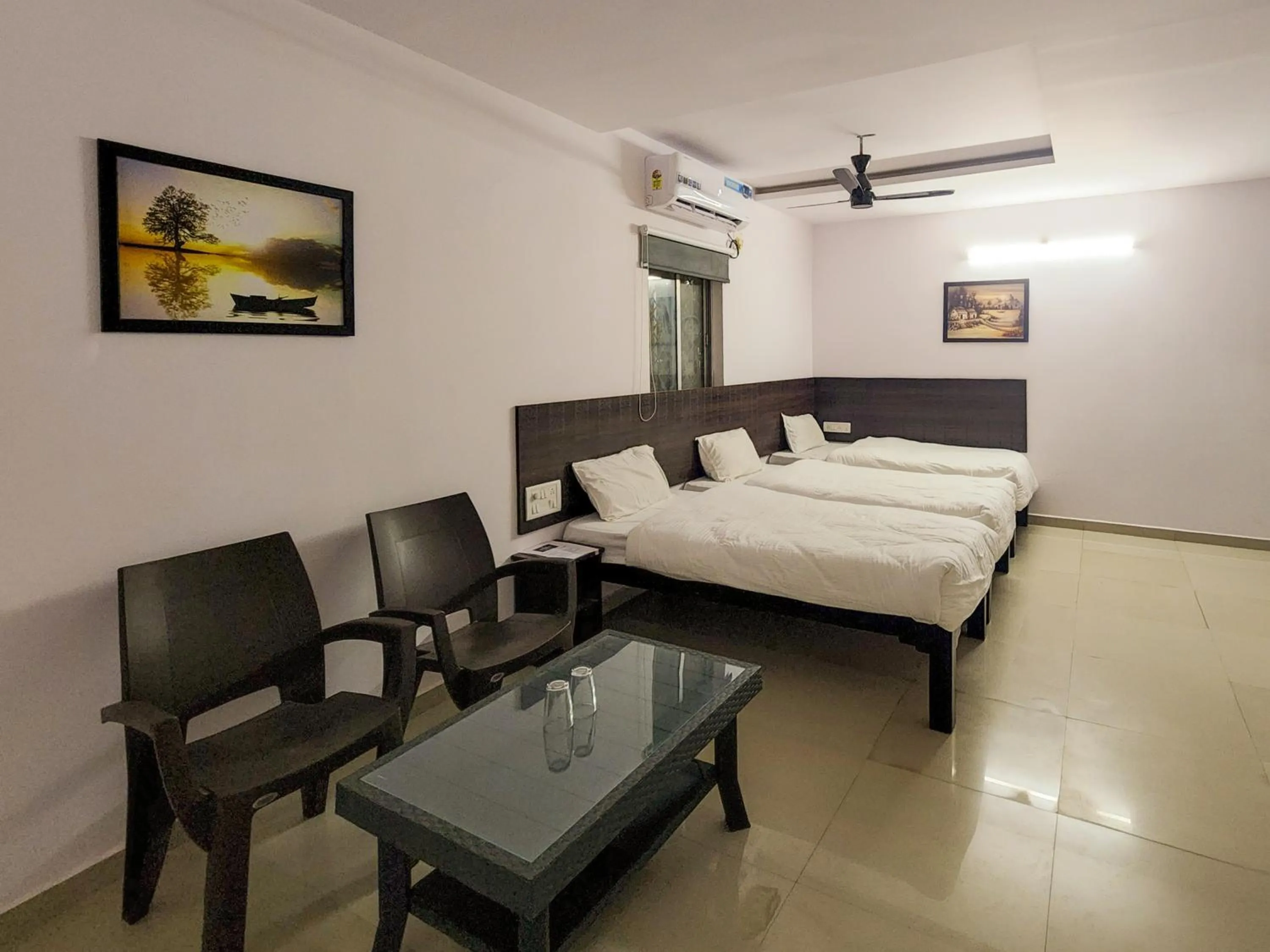 Photo of the whole room, Bed in Shivani Inn Hotel & Banquet