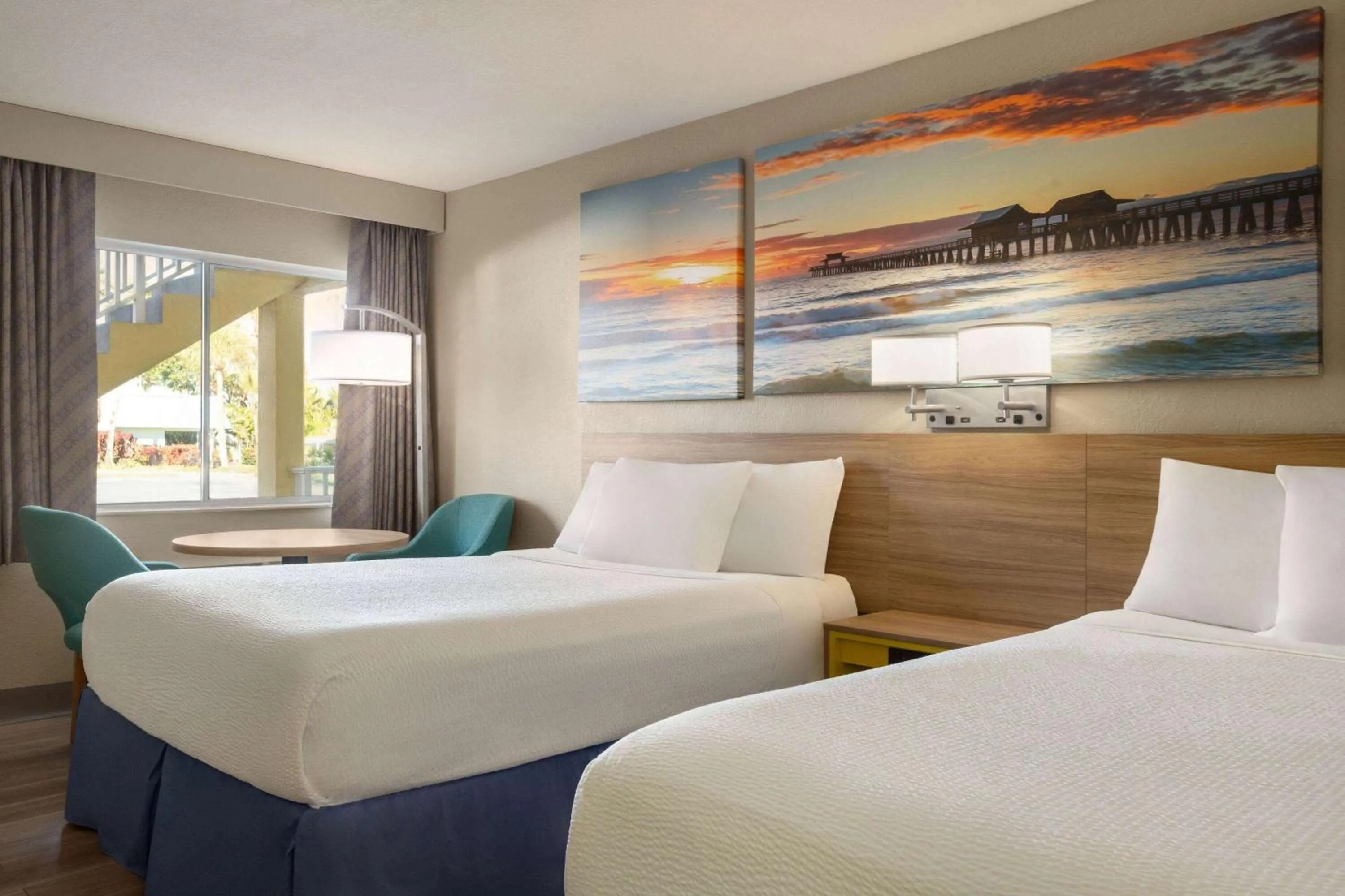 Photo of the whole room, Bed in Days Inn by Wyndham Cocoa Beach Port Canaveral