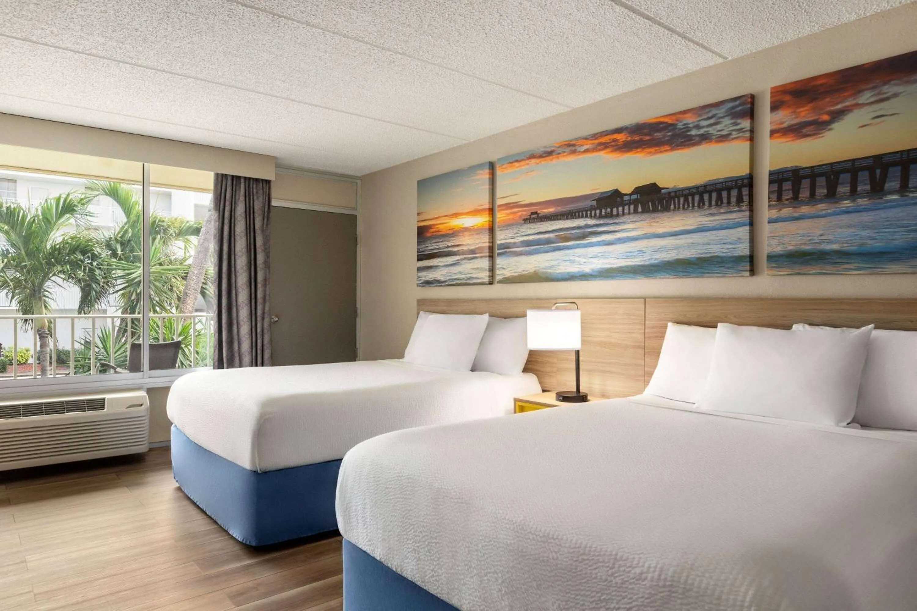 Photo of the whole room, Bed in Days Inn by Wyndham Cocoa Beach Port Canaveral