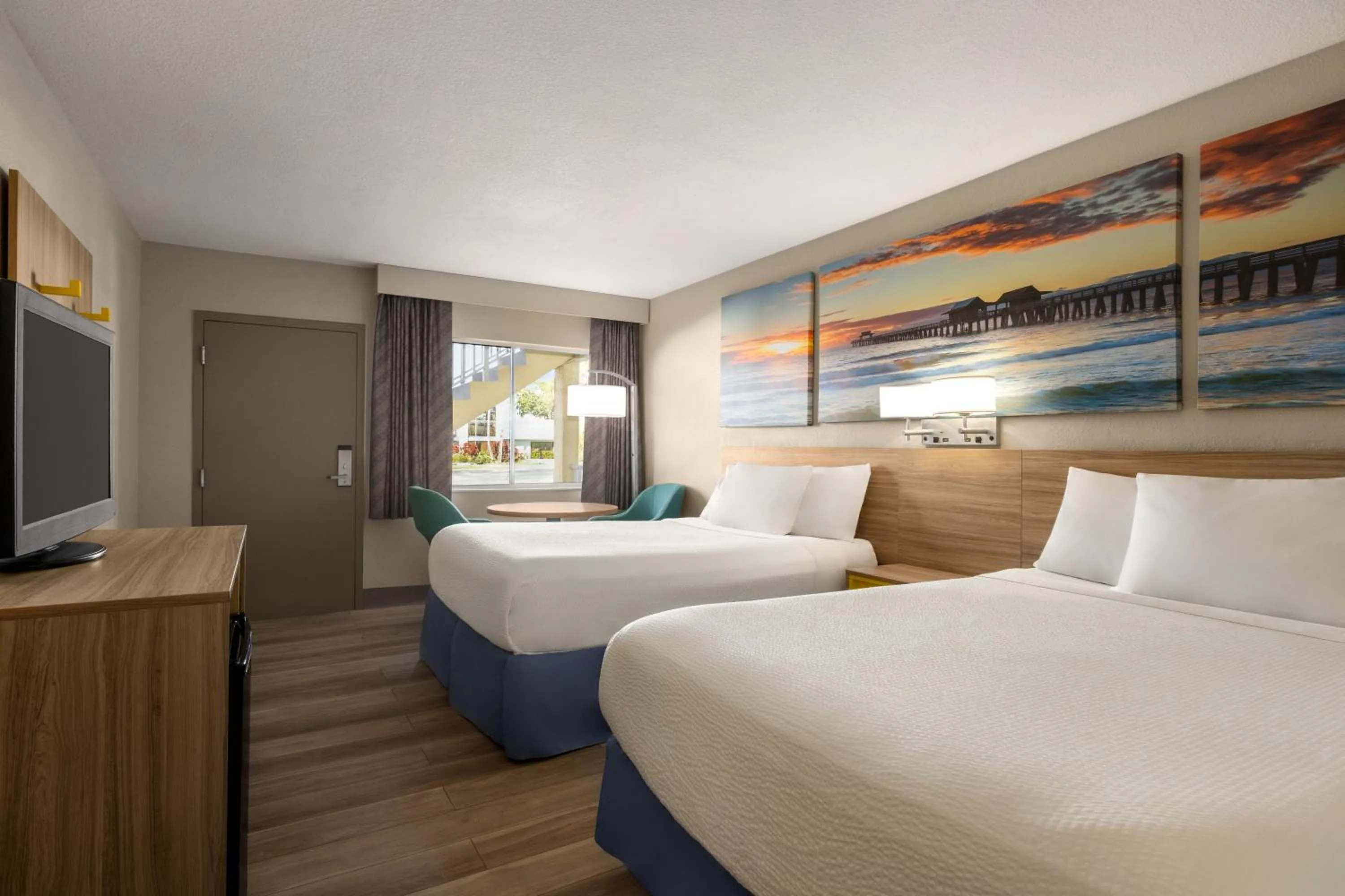 Bedroom, Bed in Days Inn by Wyndham Cocoa Beach Port Canaveral