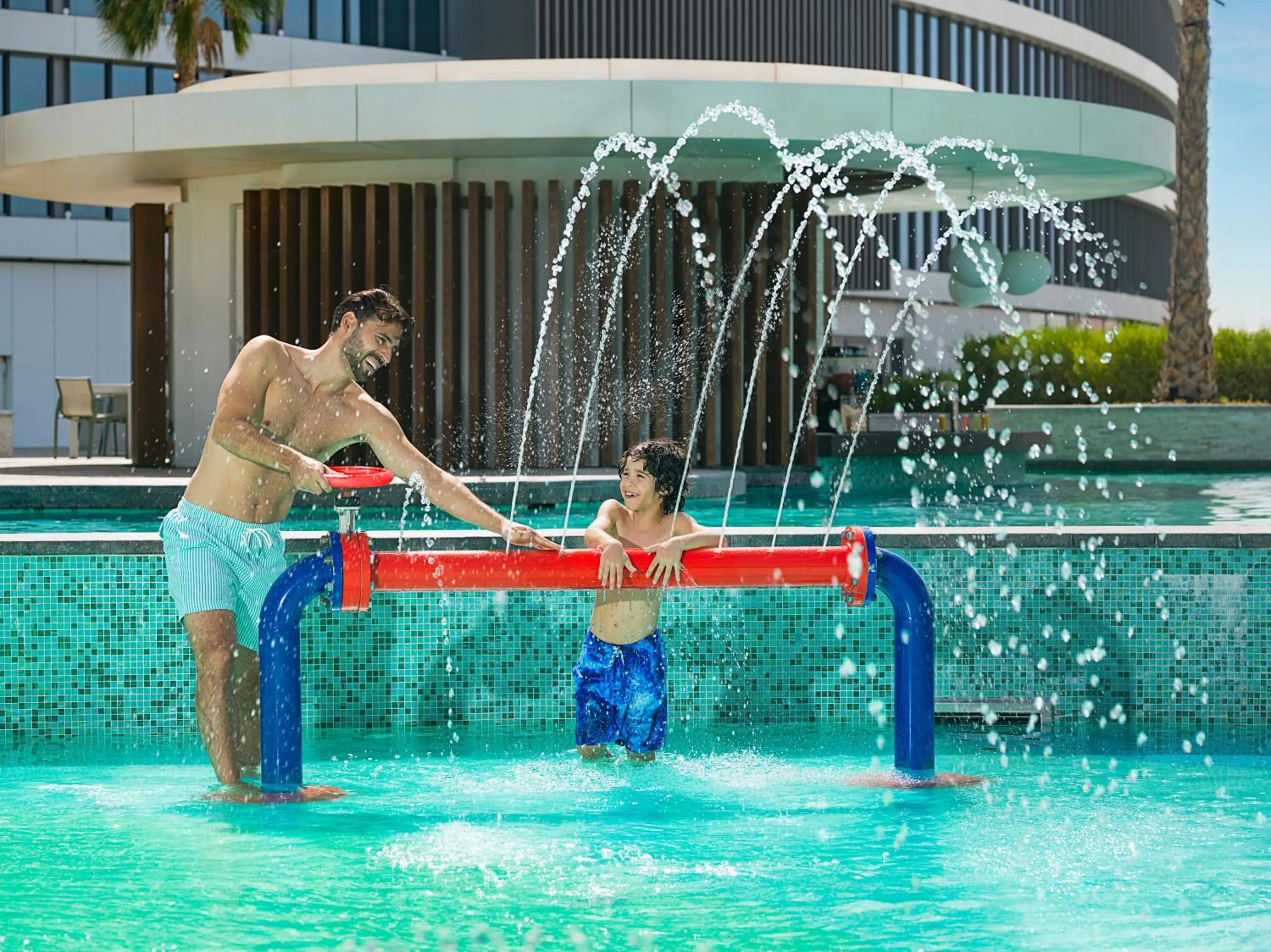 Swimming pool in The WB Abu Dhabi, Curio Collection By Hilton