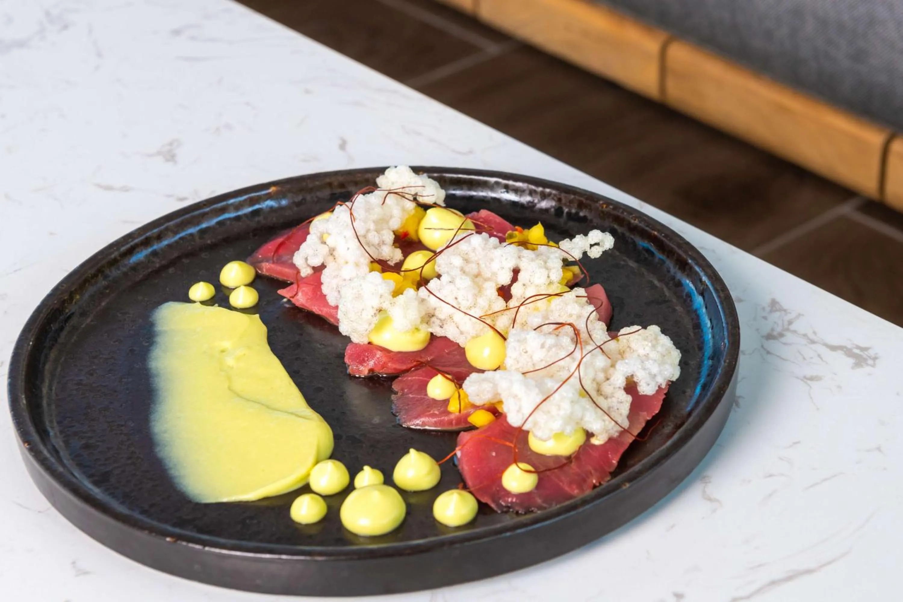 Dining area in The WB Abu Dhabi, Curio Collection By Hilton