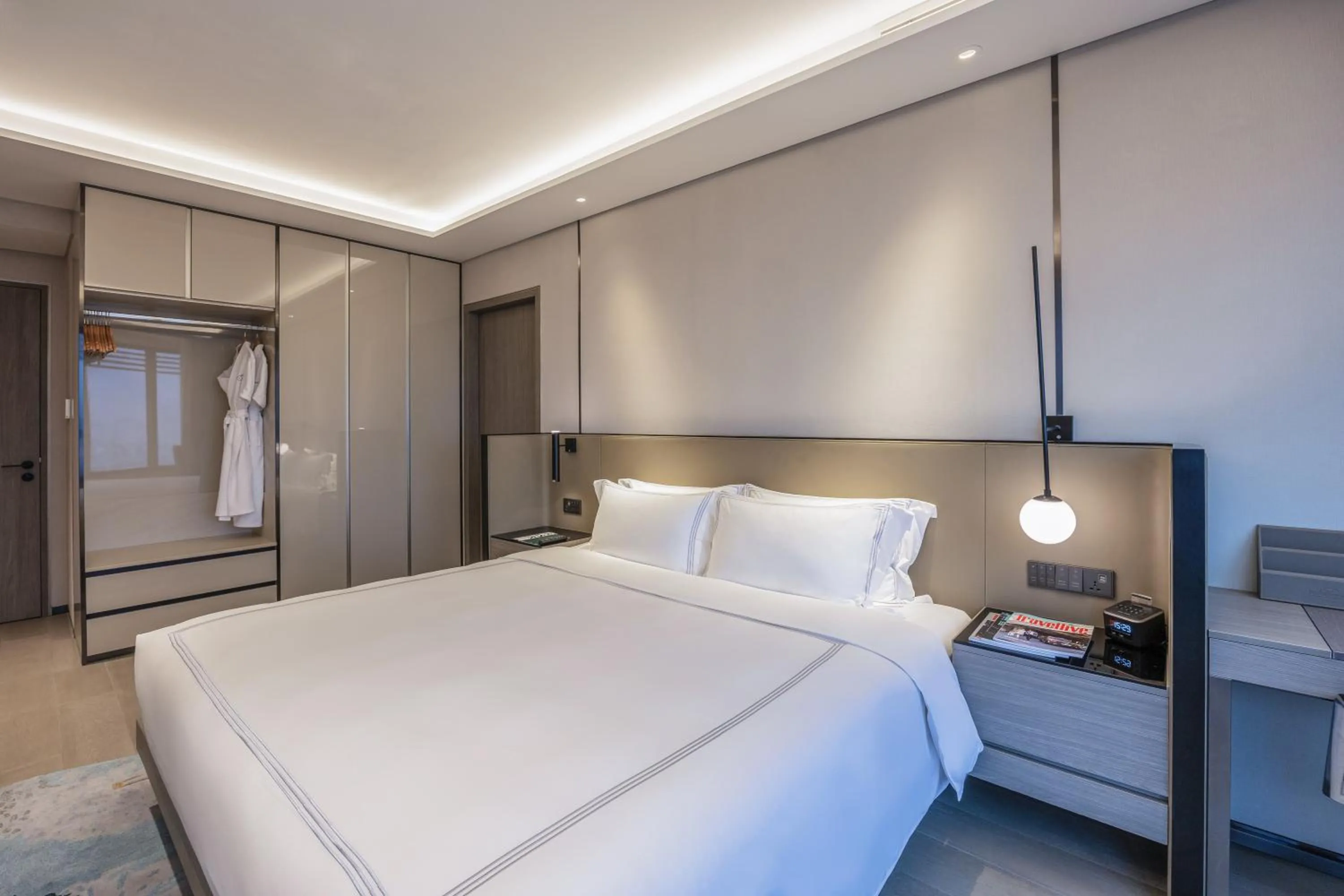 Bed in Fraser Residence Hanoi