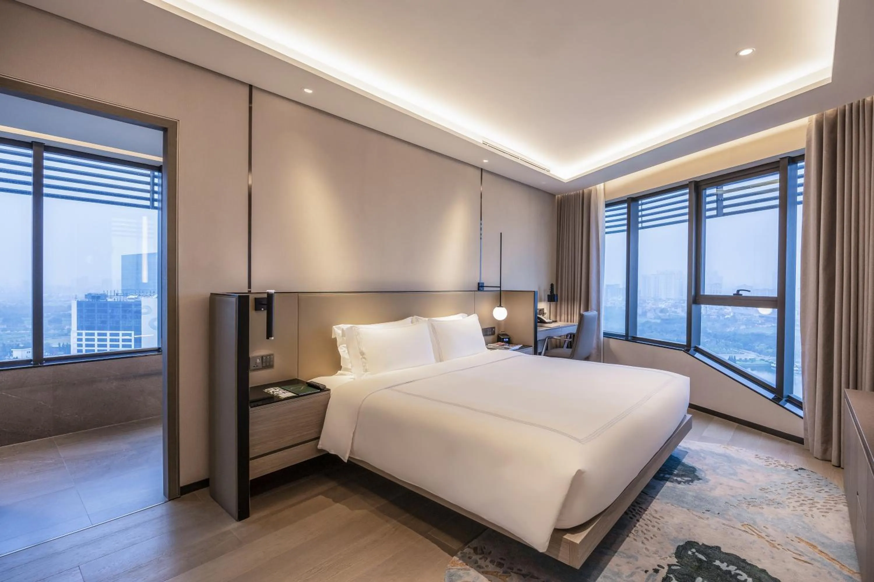 Bed in Fraser Residence Hanoi