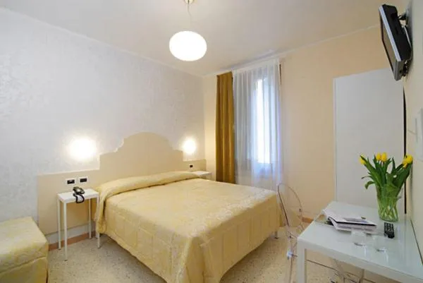 Bed in Hotel Adriatico