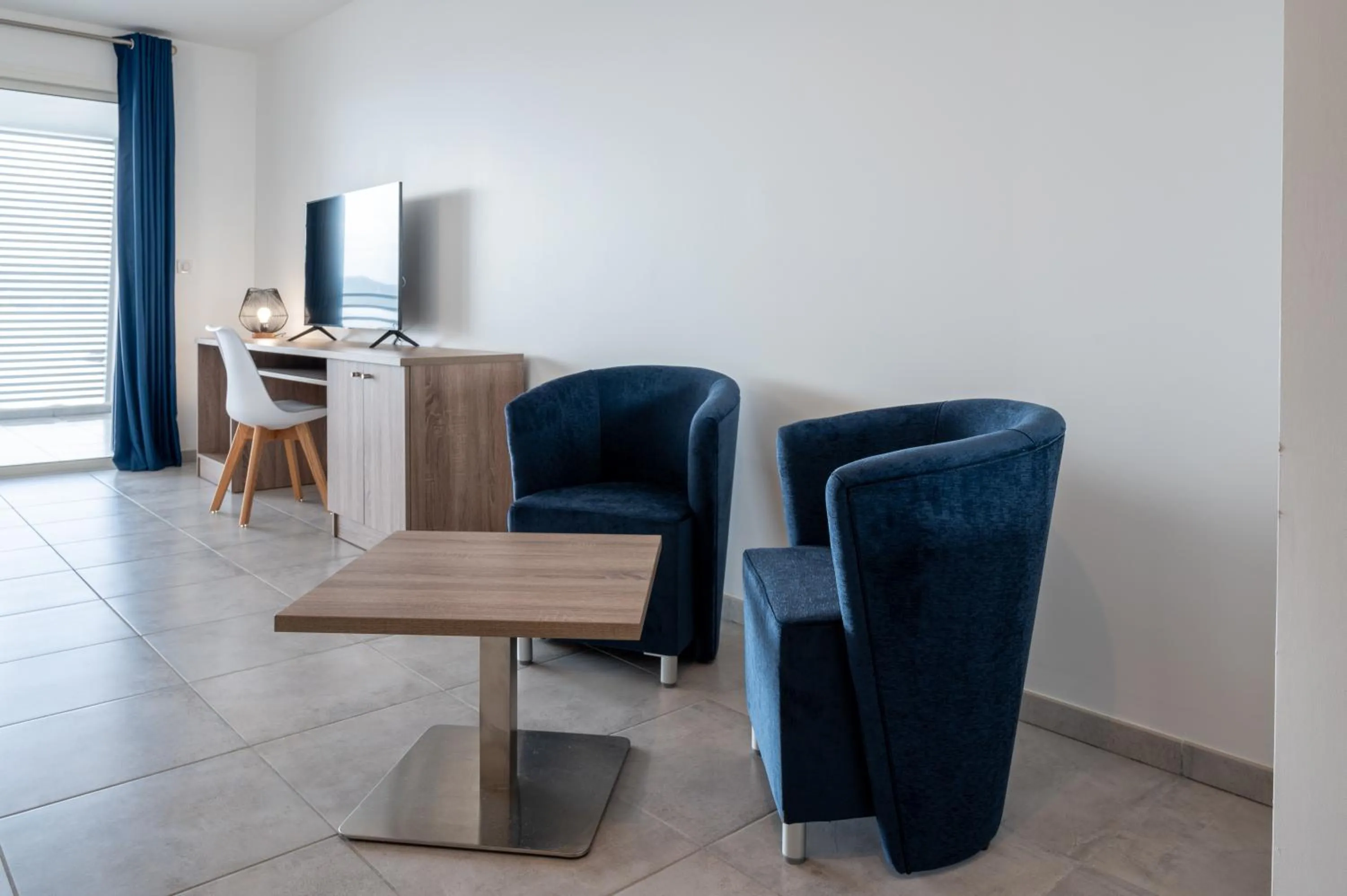 TV and multimedia in B&B HOME Fort-de-France Marina