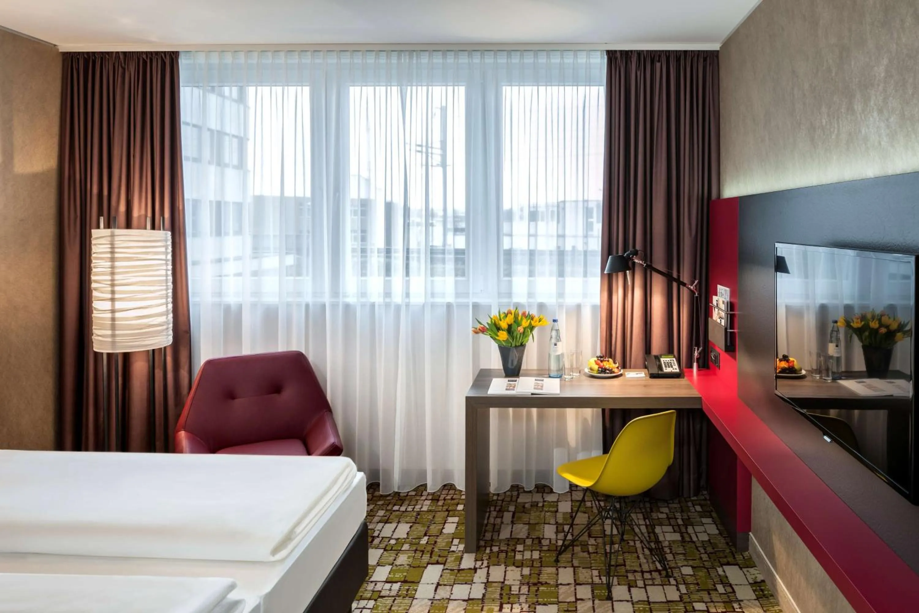 Photo of the whole room, Bed in Dorint Airport-Hotel Zürich