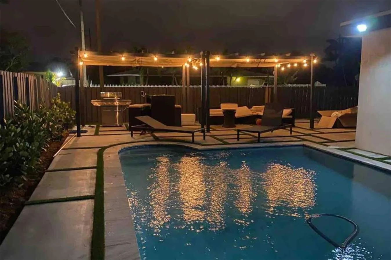 Swimming pool in Magical Miami Retreat with Heated Pool, Mini Golf, and Basketball Court L19