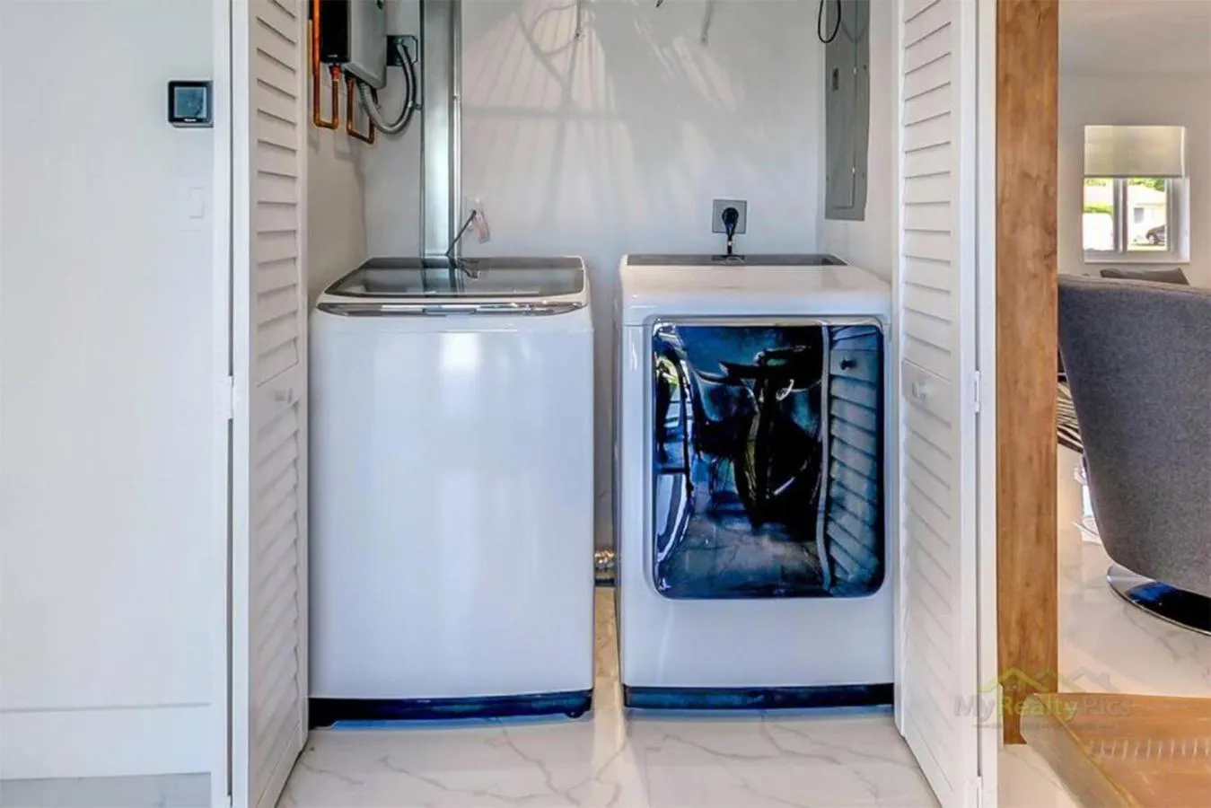 laundry in Magical Miami Retreat with Heated Pool, Mini Golf, and Basketball Court L19