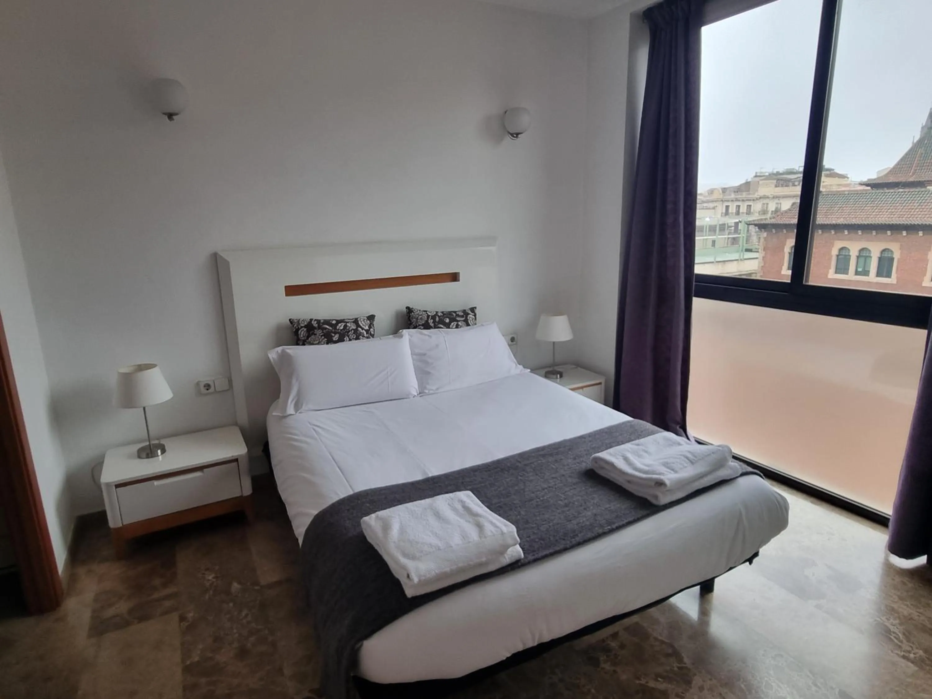 Bed in Picasso Suites