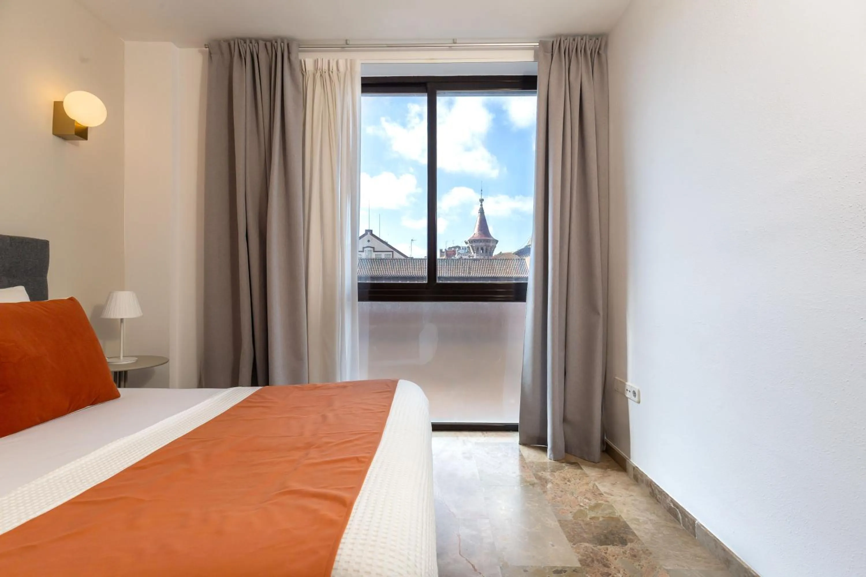 Photo of the whole room, Bed in Picasso Suites