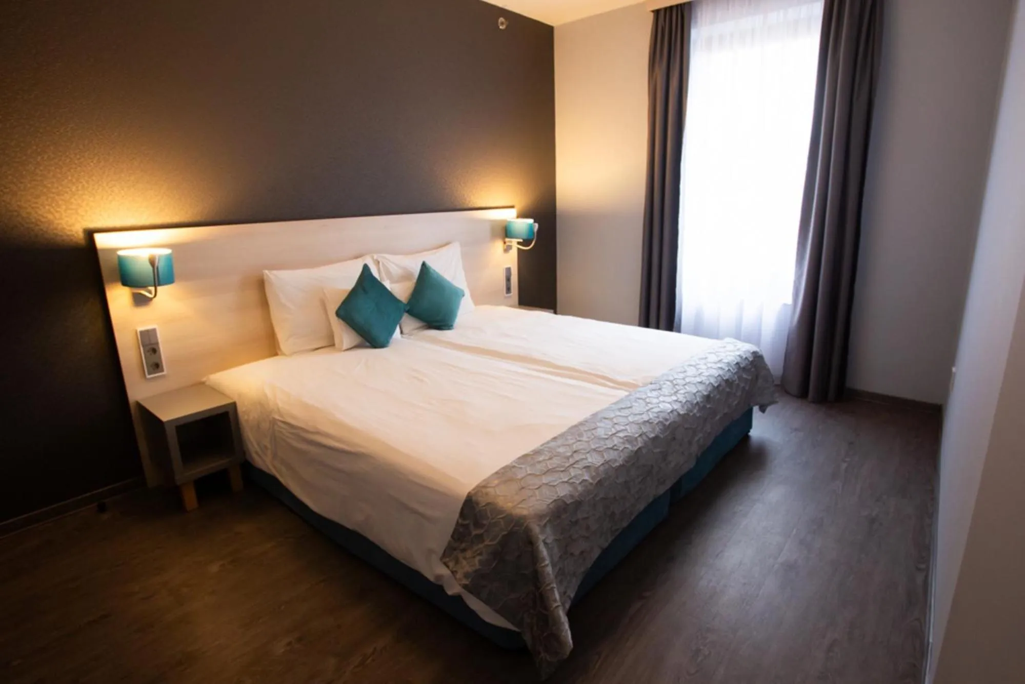 Bed in Hotel Regnum Residence