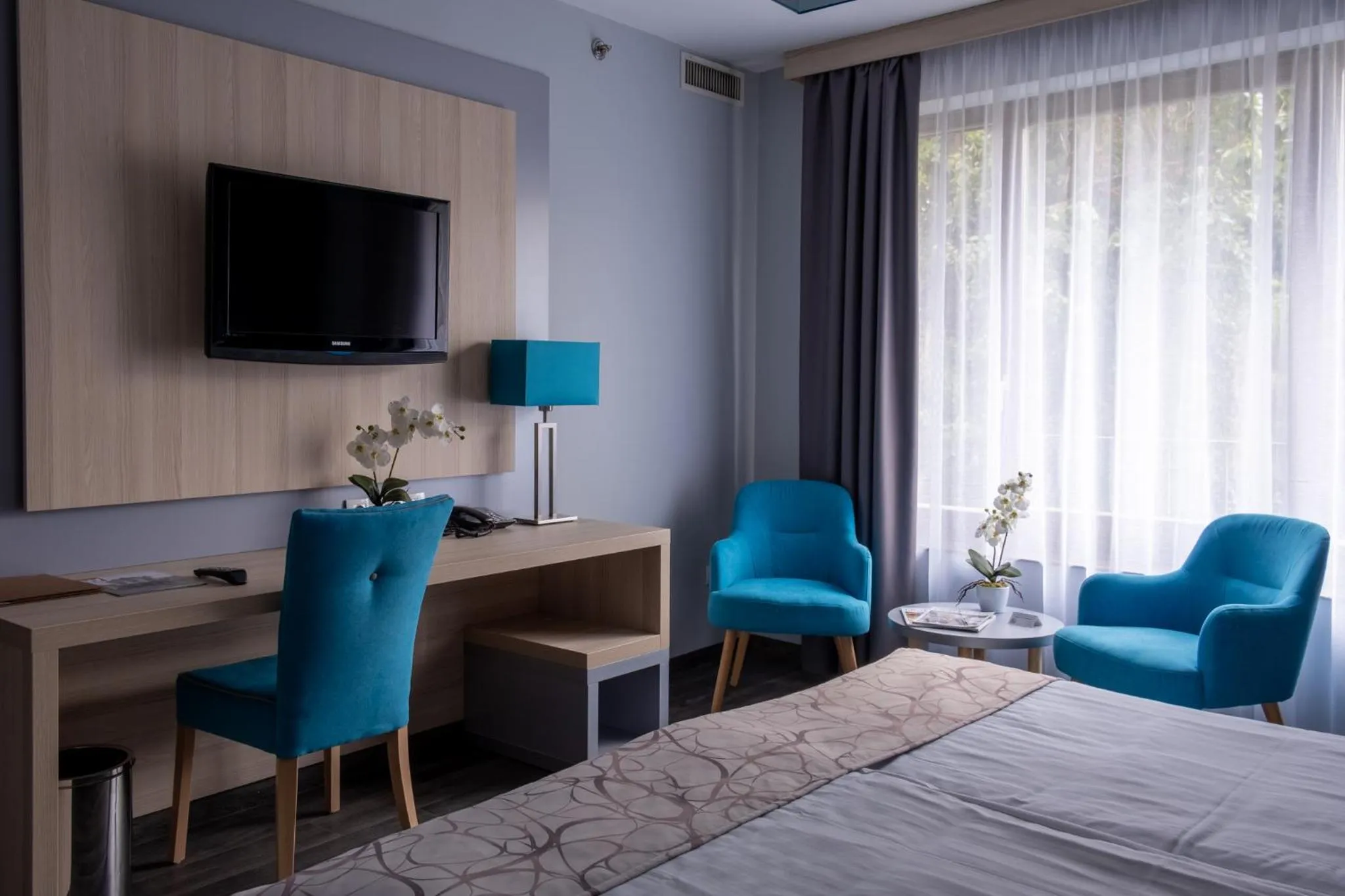 Living room, Bed in Hotel Regnum Residence