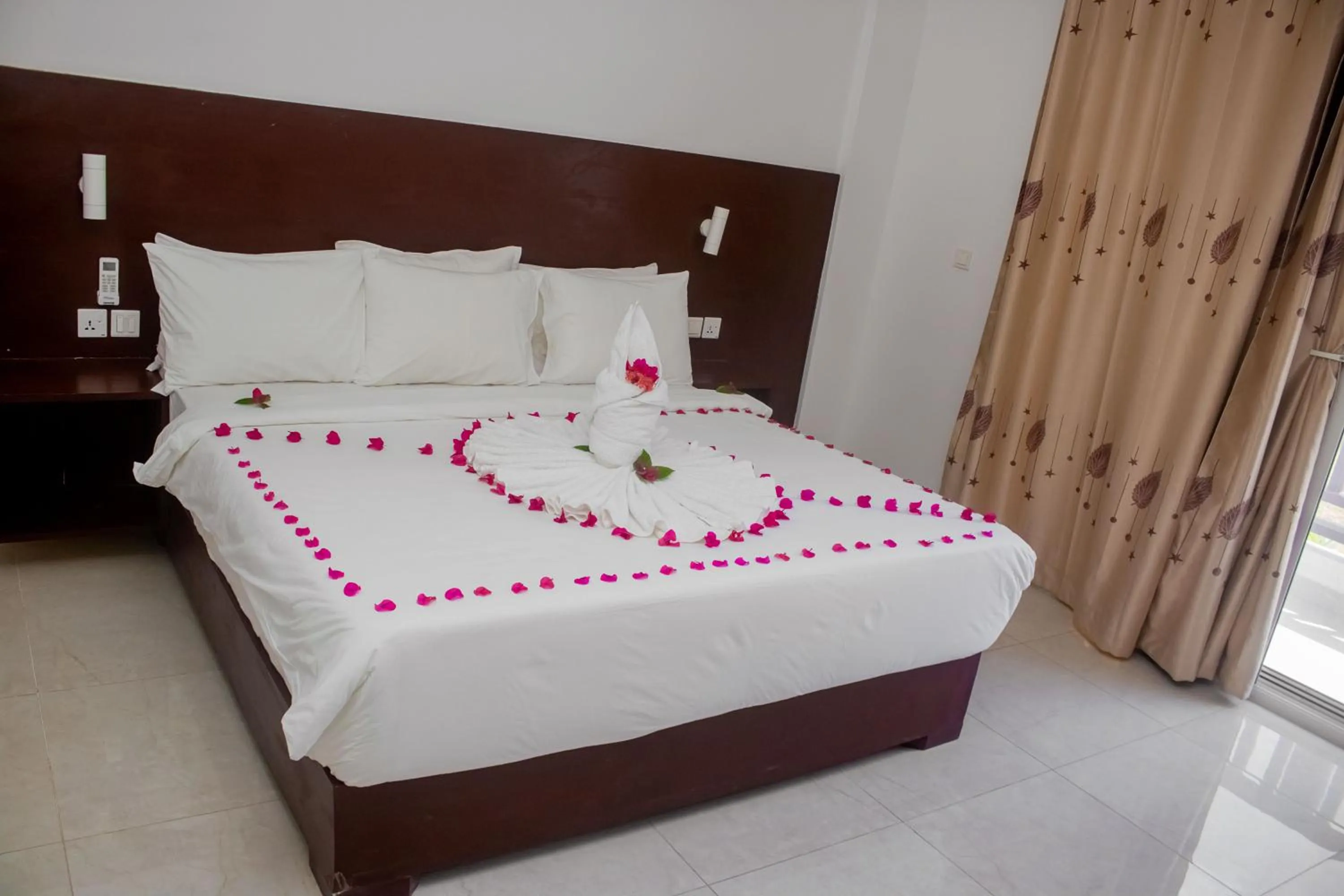 Bed in Malika Nungwi Hotel