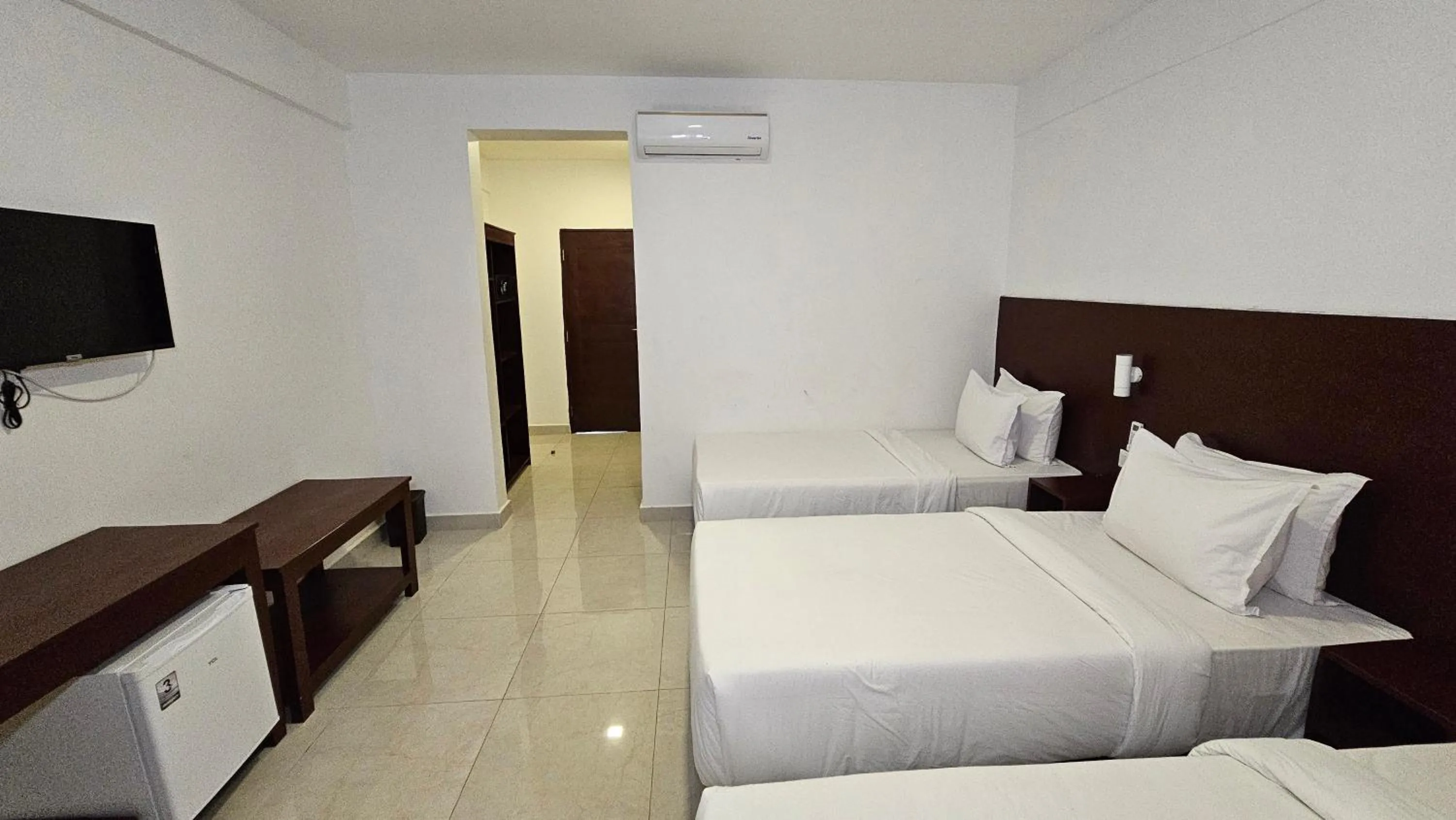 Bed in Malika Nungwi Hotel