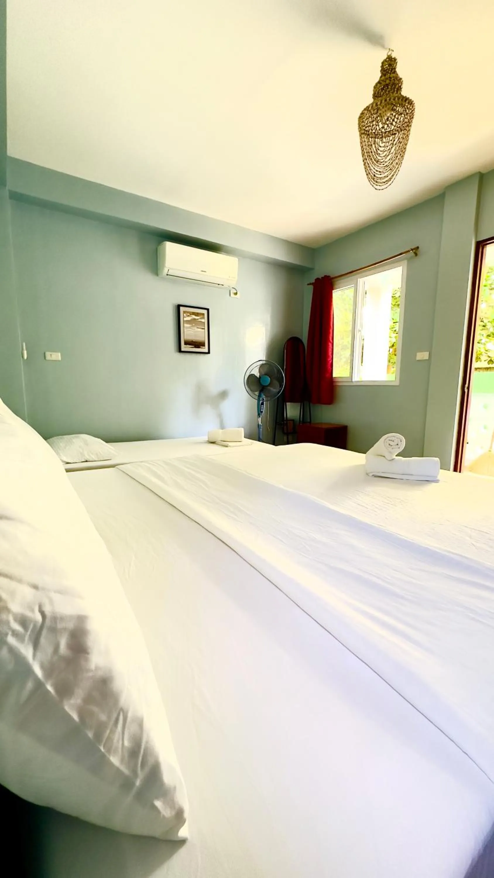 Bed in In Dai Aquasports and Beach Resort