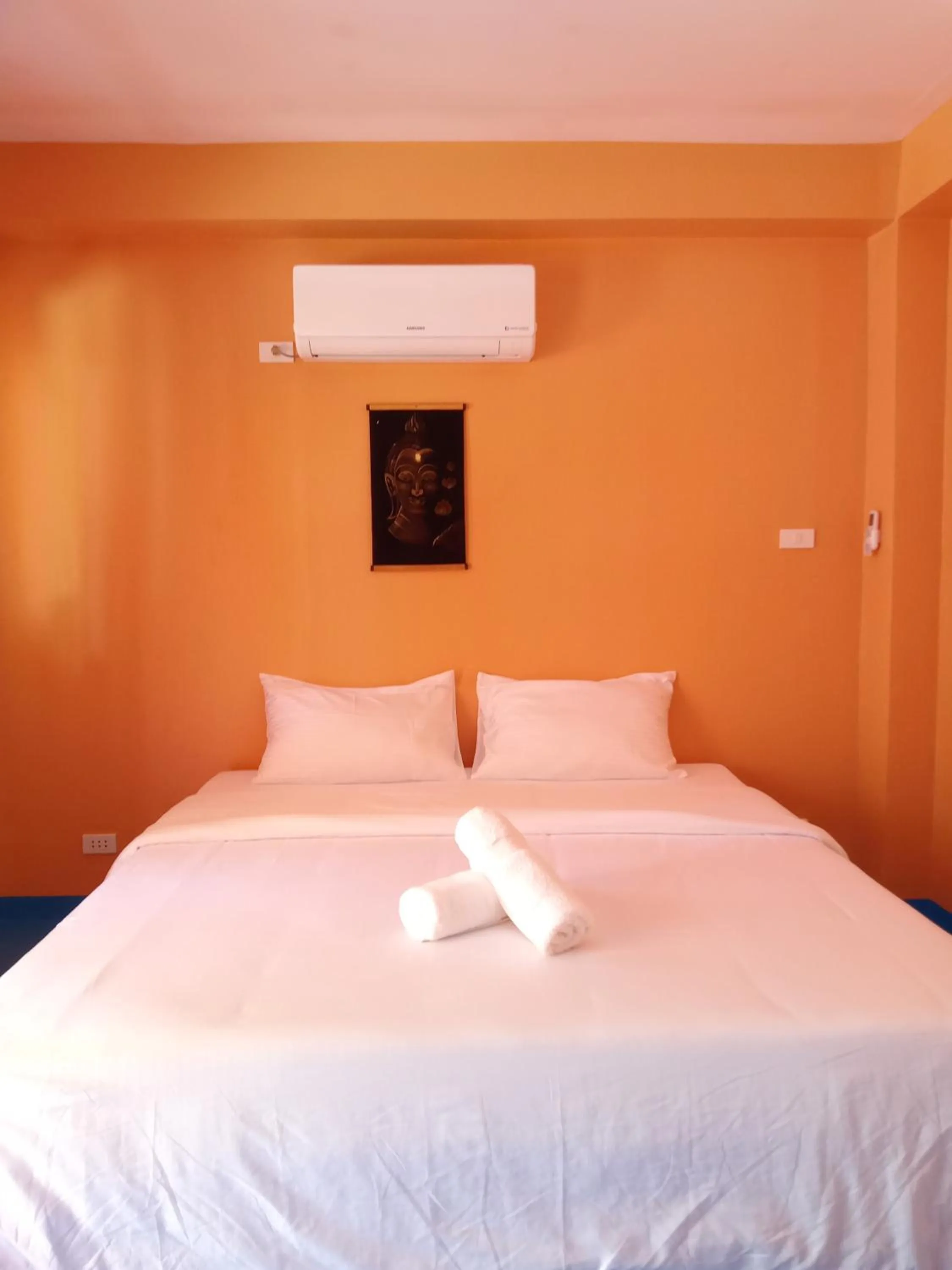 Bed in In Dai Aquasports and Beach Resort