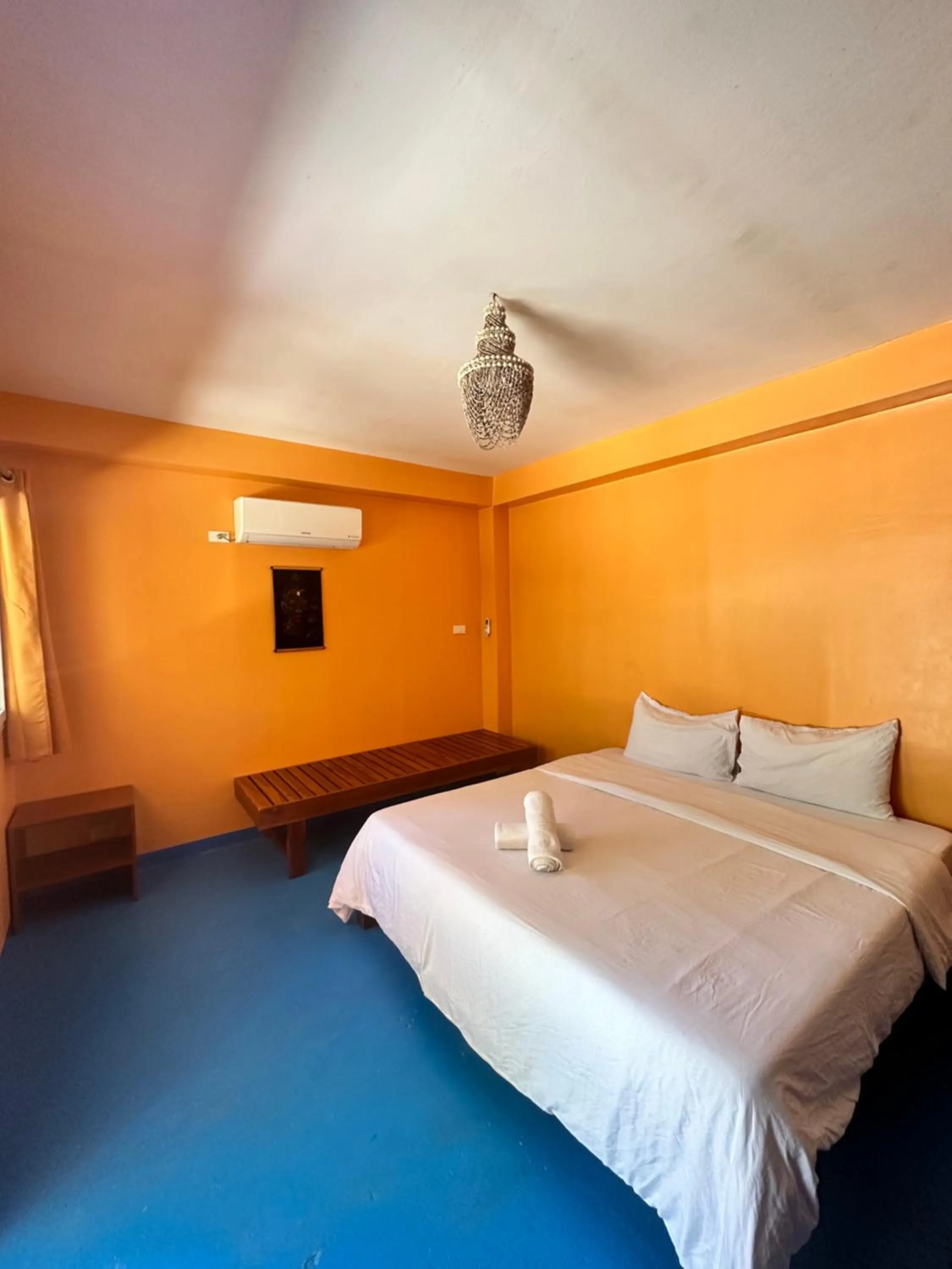 Bed in In Dai Aquasports and Beach Resort